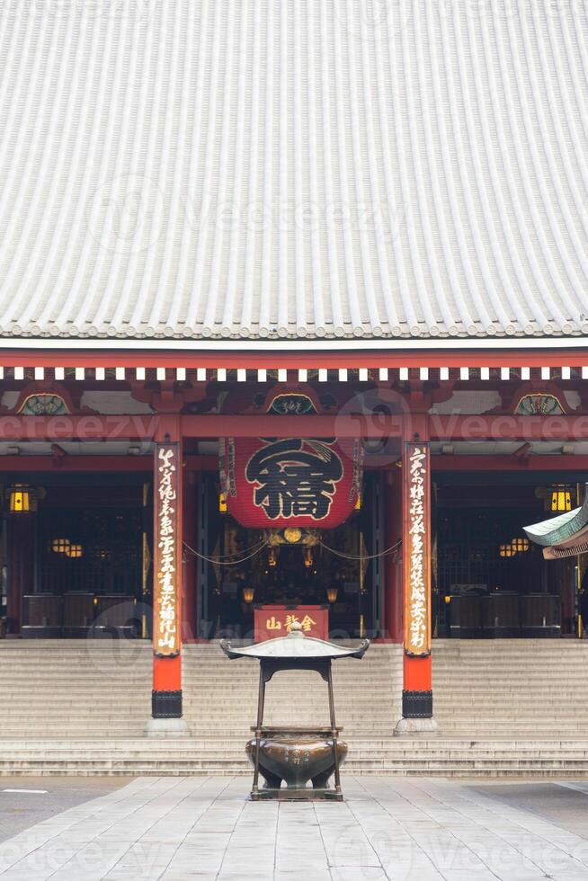 A large building with a red roof photo