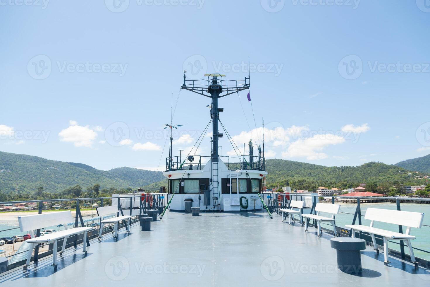 A boat with a white deck photo