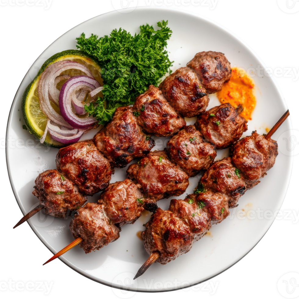 Meat skewers with vegetables and onions on a plate png