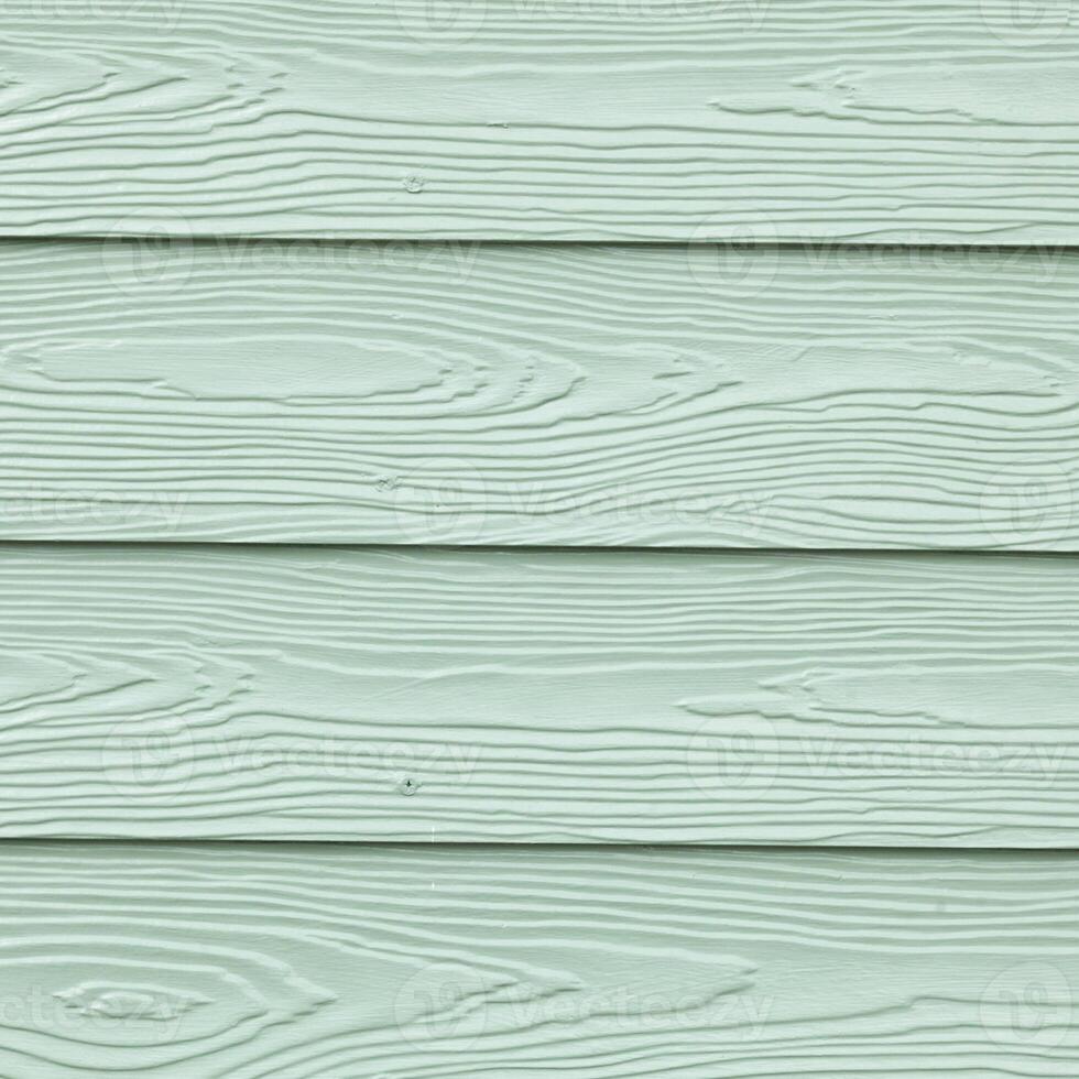 A close up of a green painted wood wall photo