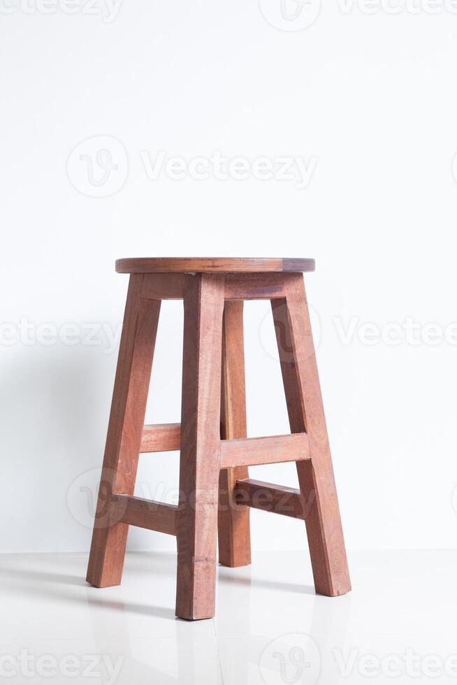 A stool made from wood on a white background photo