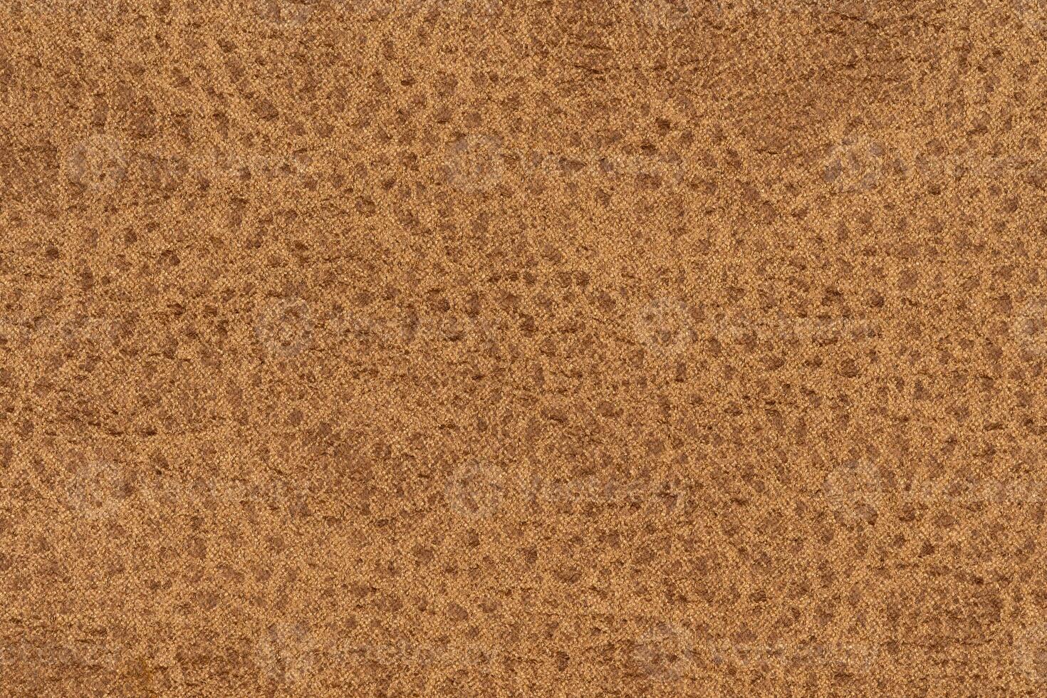 Brown color woven hand abstract textile pattern for background. Image of tawny color fabric material photo