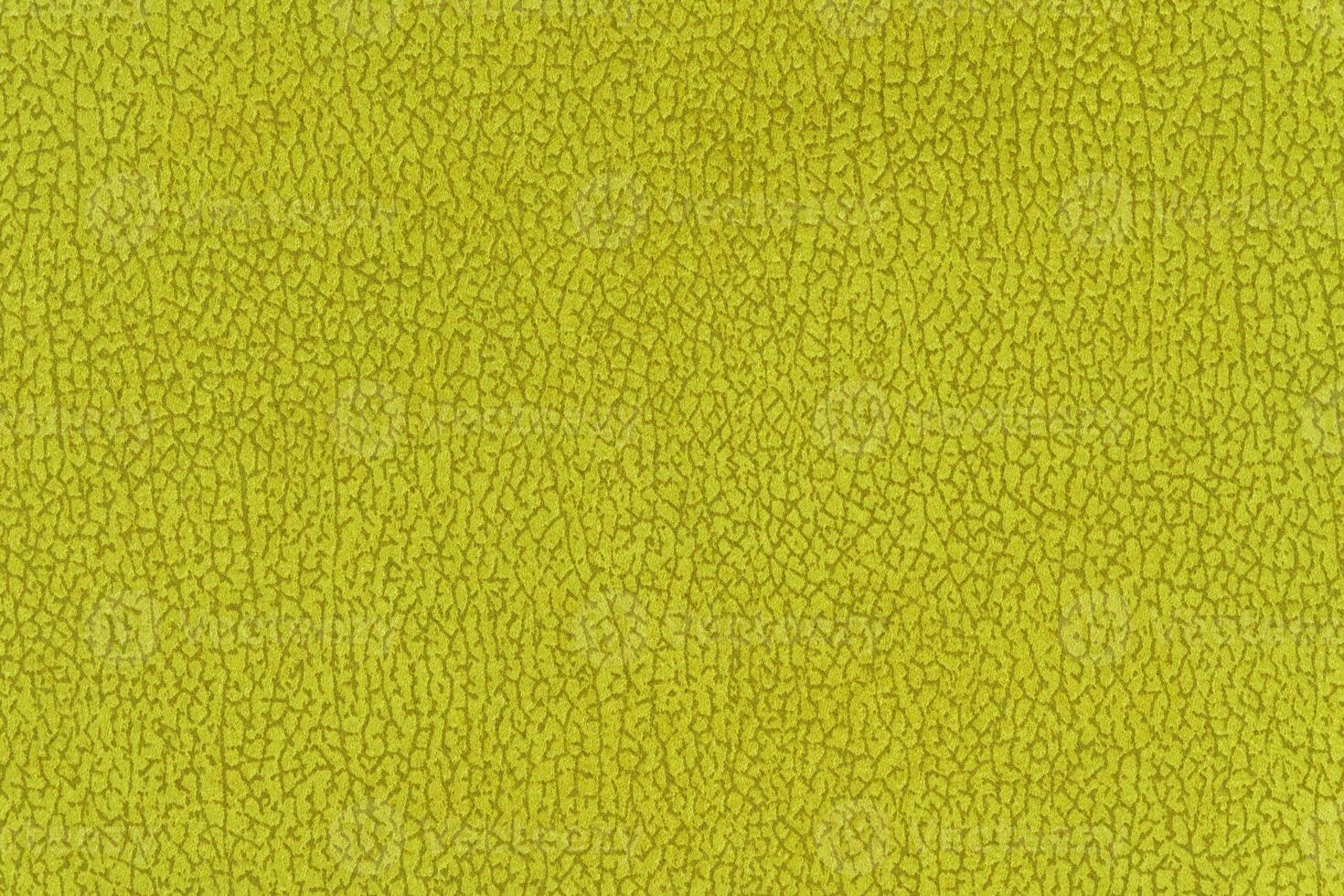 Yellow color abstract textile pattern background. Citrus colour fabric material, colored background photo