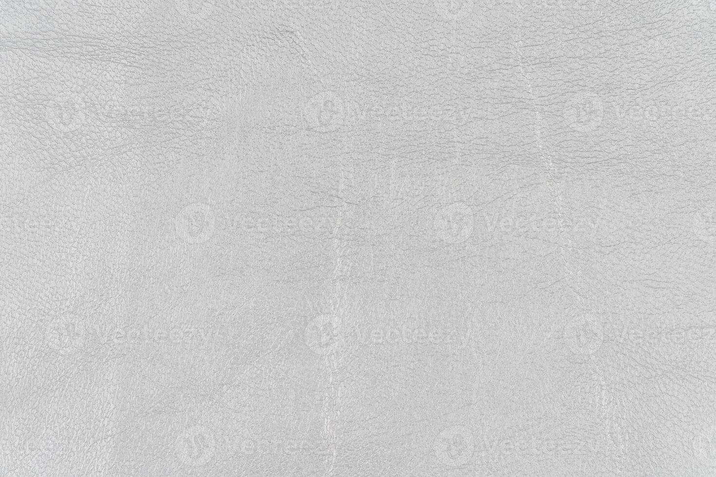 Light gray abstract synthetic leather pattern for design. Surface artificial leather material photo