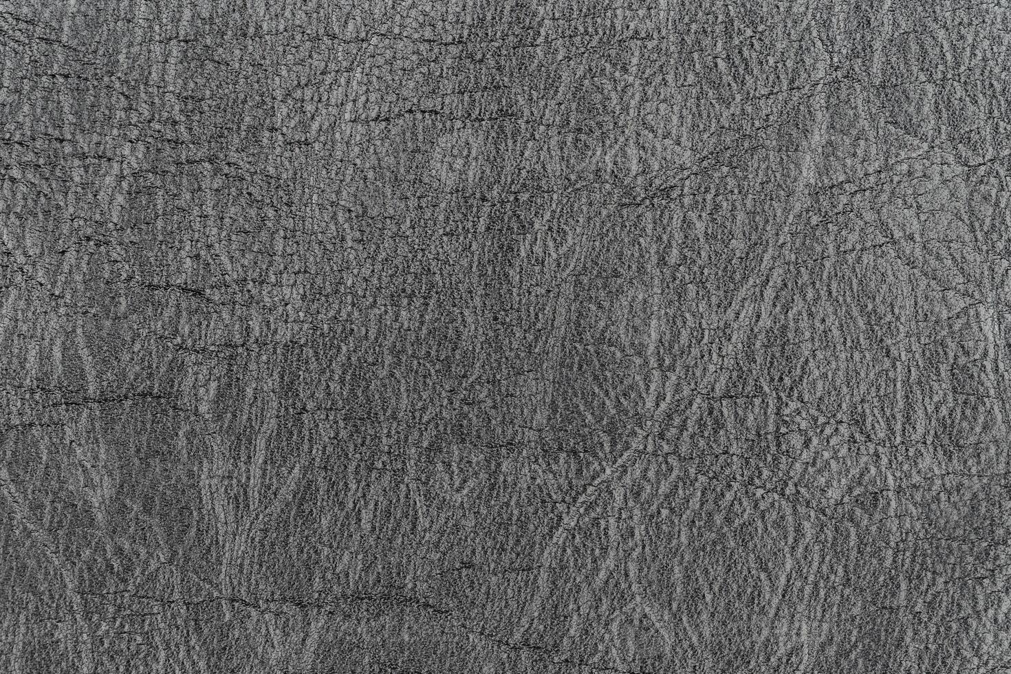 Dark gray color abstract unique faux leather pattern for background, artificial leather material photo
