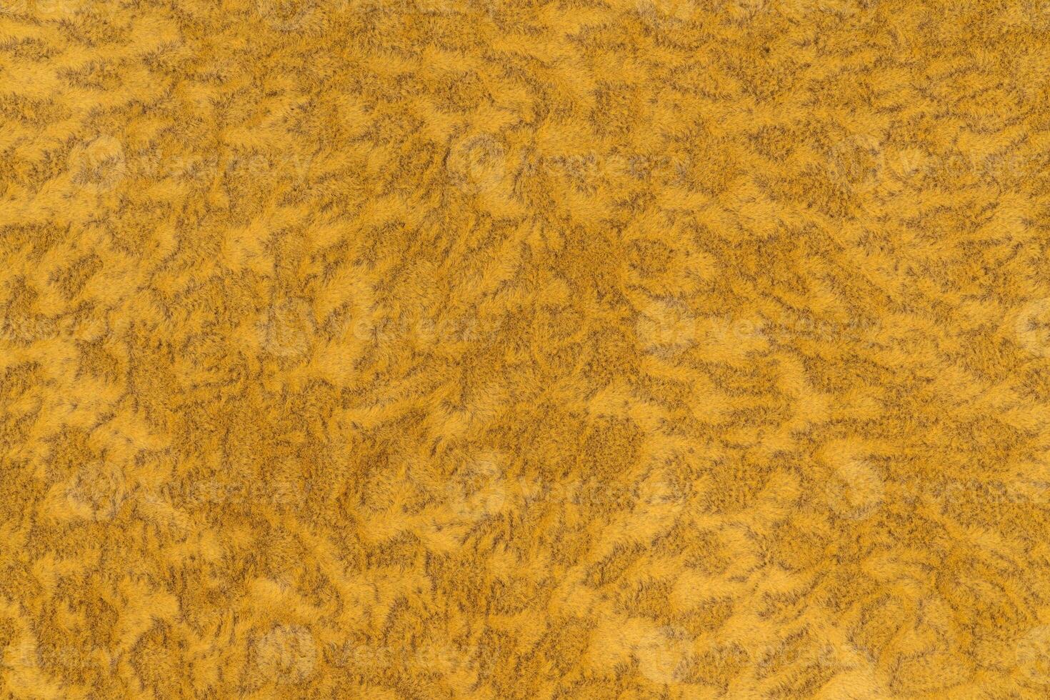 Yellow color velvet or velour with short haired fluffy and soft texture background. Close-up photo