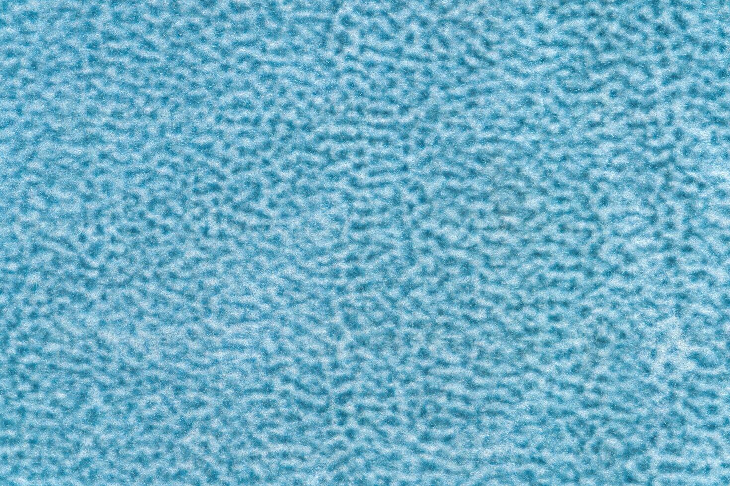 Light blue color velvet with short haired fluffy and soft texture background. sapphire colour velour photo