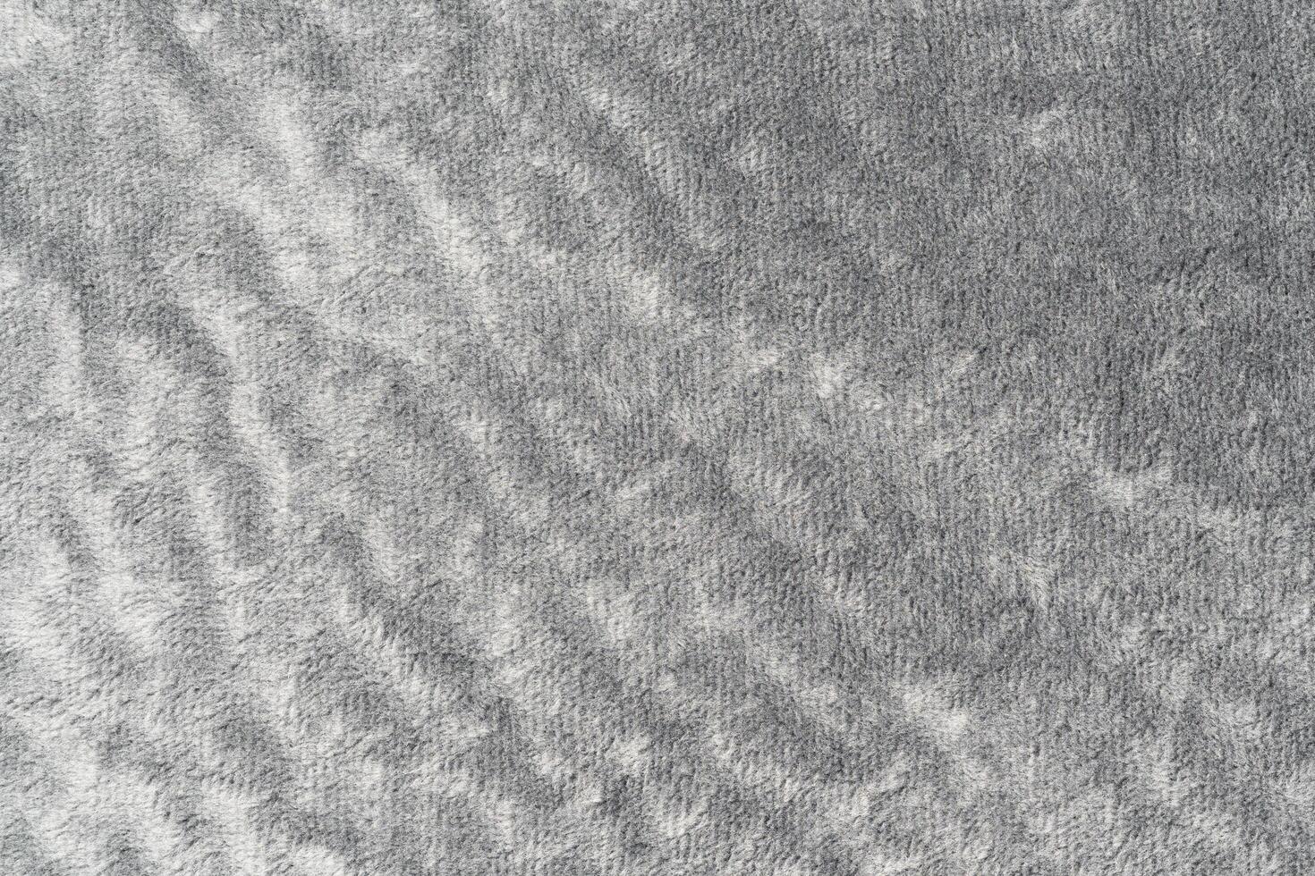 Gray color velvet or velour with short pile fluffy and soft texture background for design photo