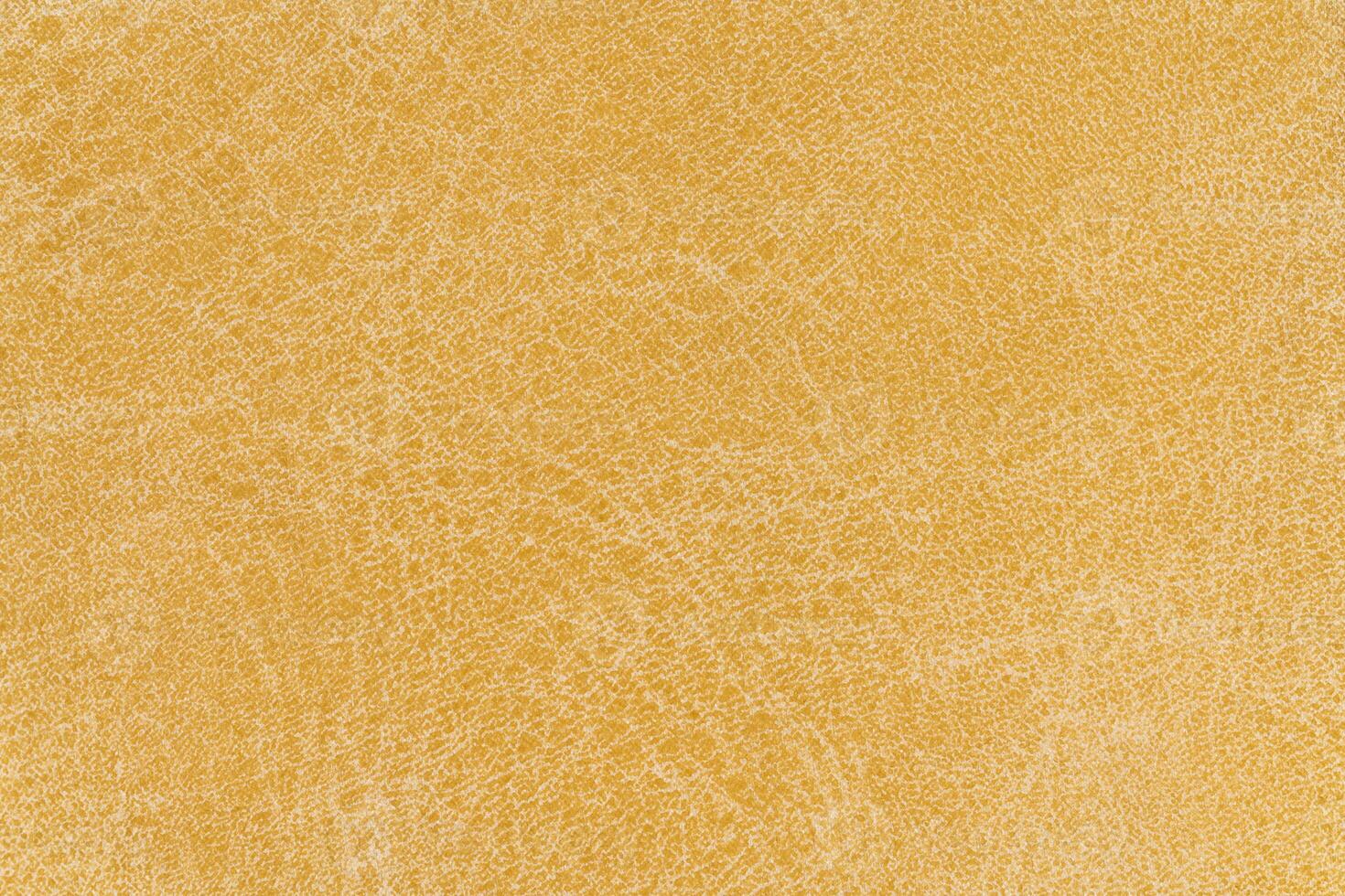Pale yellow color abstract textile pattern for background. Close-up mustard colour fabric material photo