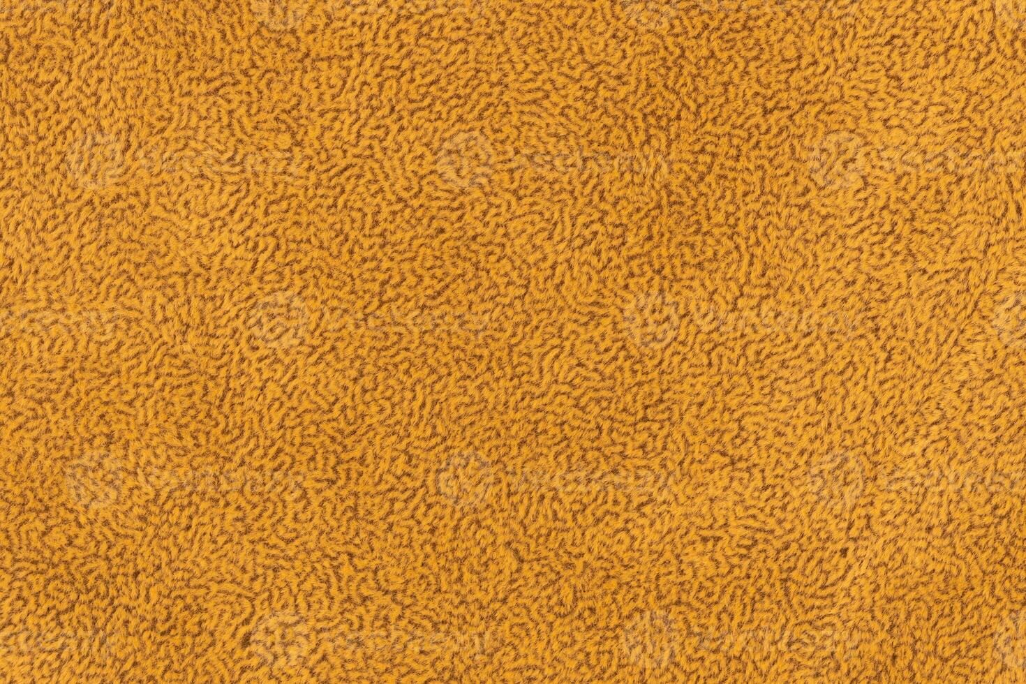 Yellow color fabric material with short haired fluffy and soft texture background photo
