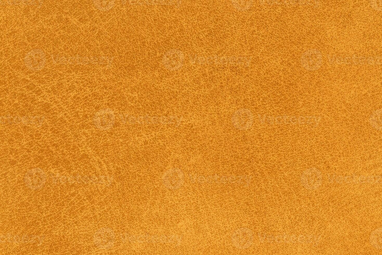 Vibrant yellow color abstract textile pattern for background. Bright gold colored fabric material photo