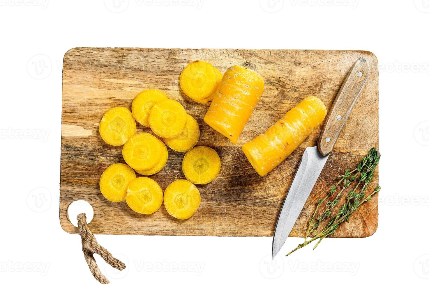 Sliced fresh Yellow carrots without tops, the concept of cooking vegetables. Isolated on white background. Top view. photo