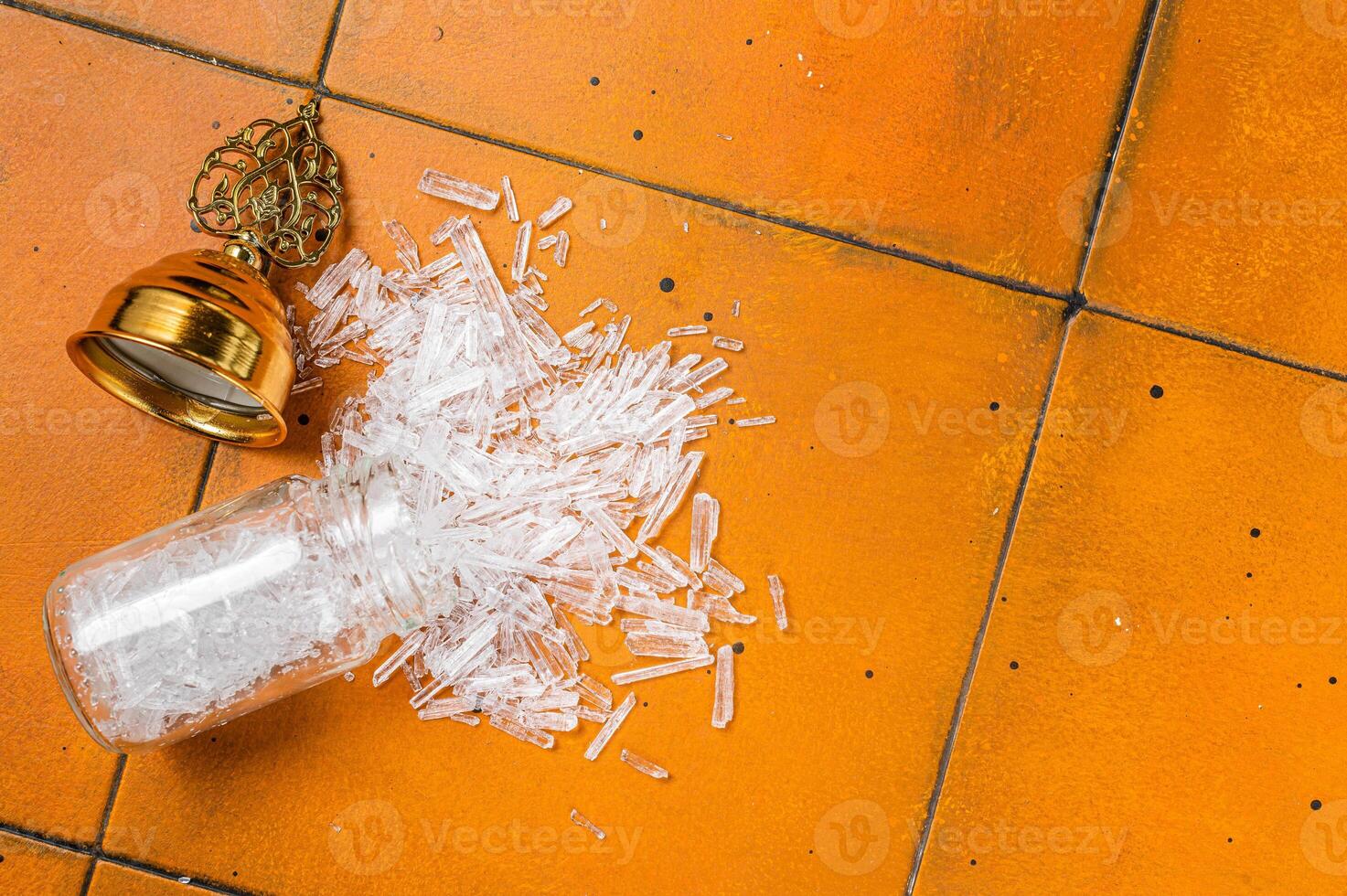 Natural Menthol Crystals, Ingredients for production of natural cosmetics. Orange background. Top view. Copy space photo