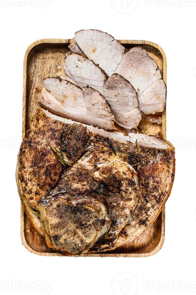 Roast sliced pork knuckle. Leg meat. Isolated on white background. Top view. photo