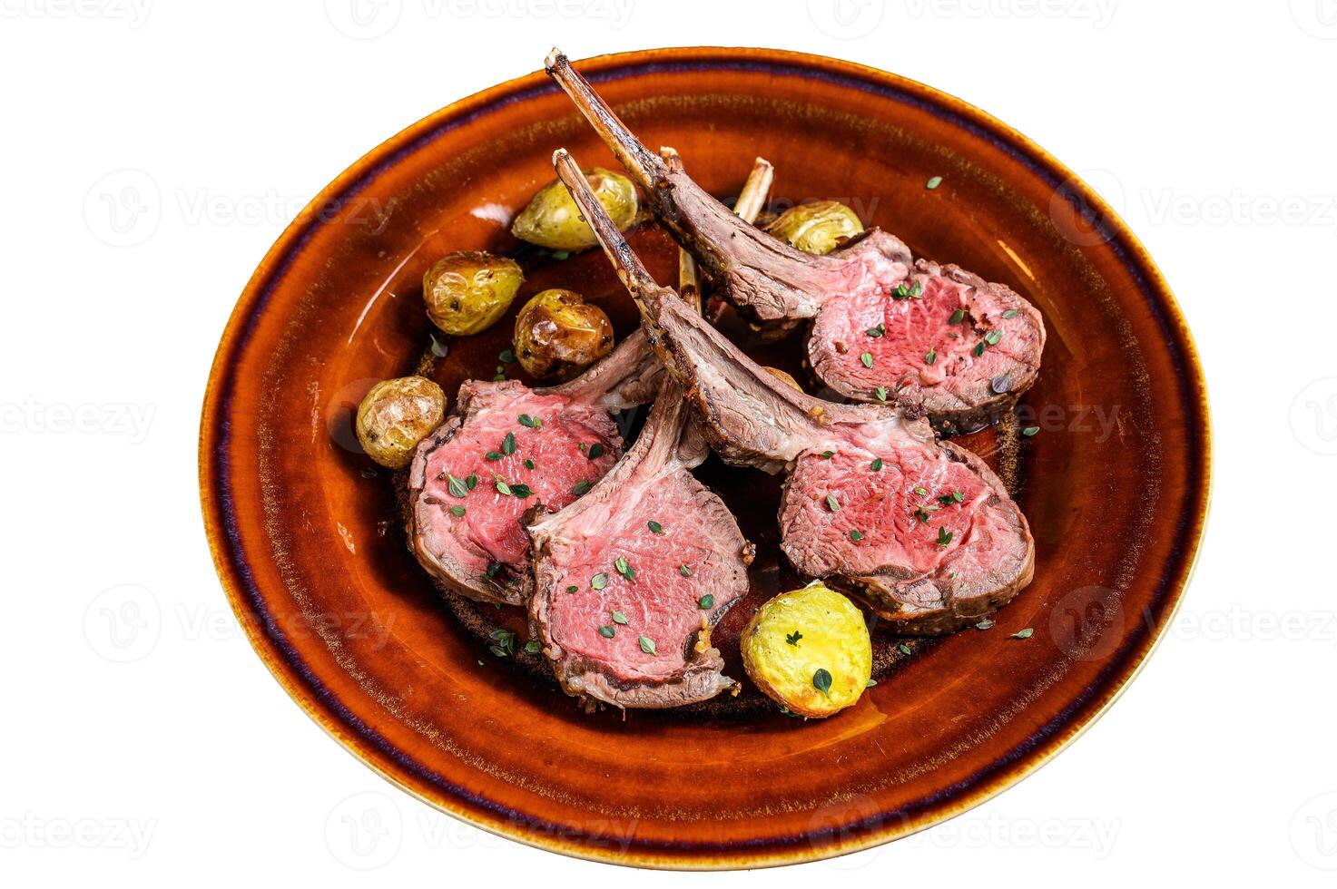 Roasted lamb meat rib chop steaks with potato. Isolated on white background. photo