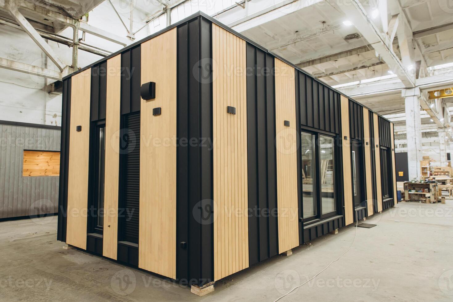 Modern modular house under construction in a factory photo