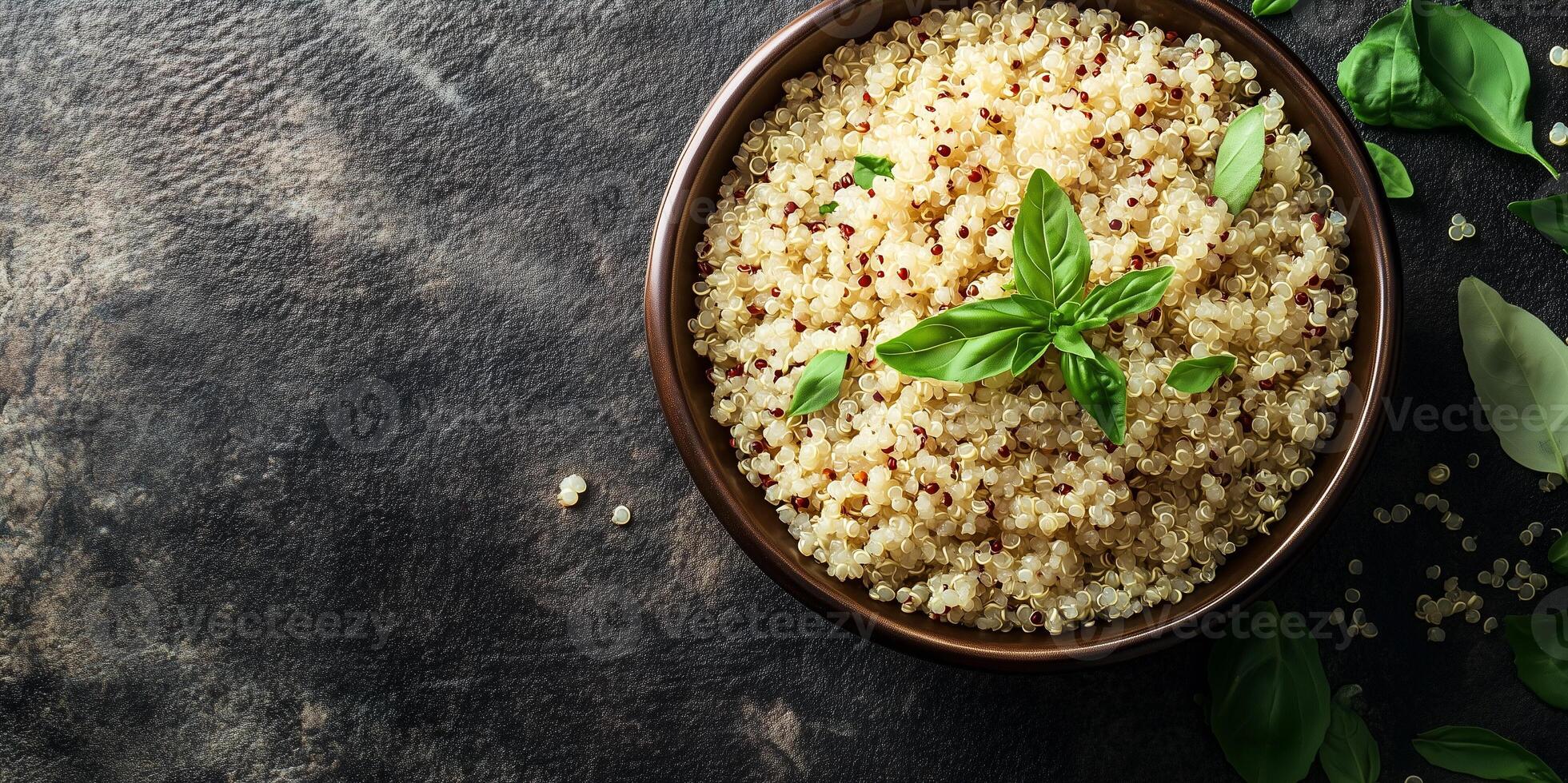 Quinoa neatly arranged in a deep, round ceramic bowl with visible grains and garnish, food photography photo