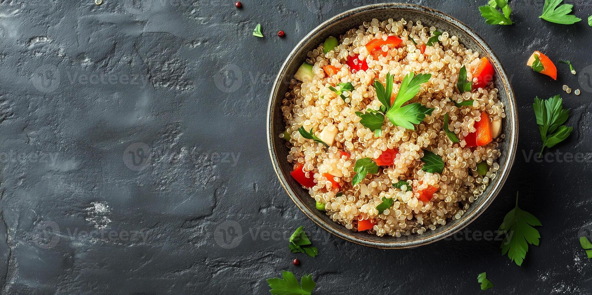 Quinoa portion served in a deep ceramic bowl with visible ingredients and simple garnish, meal photography photo