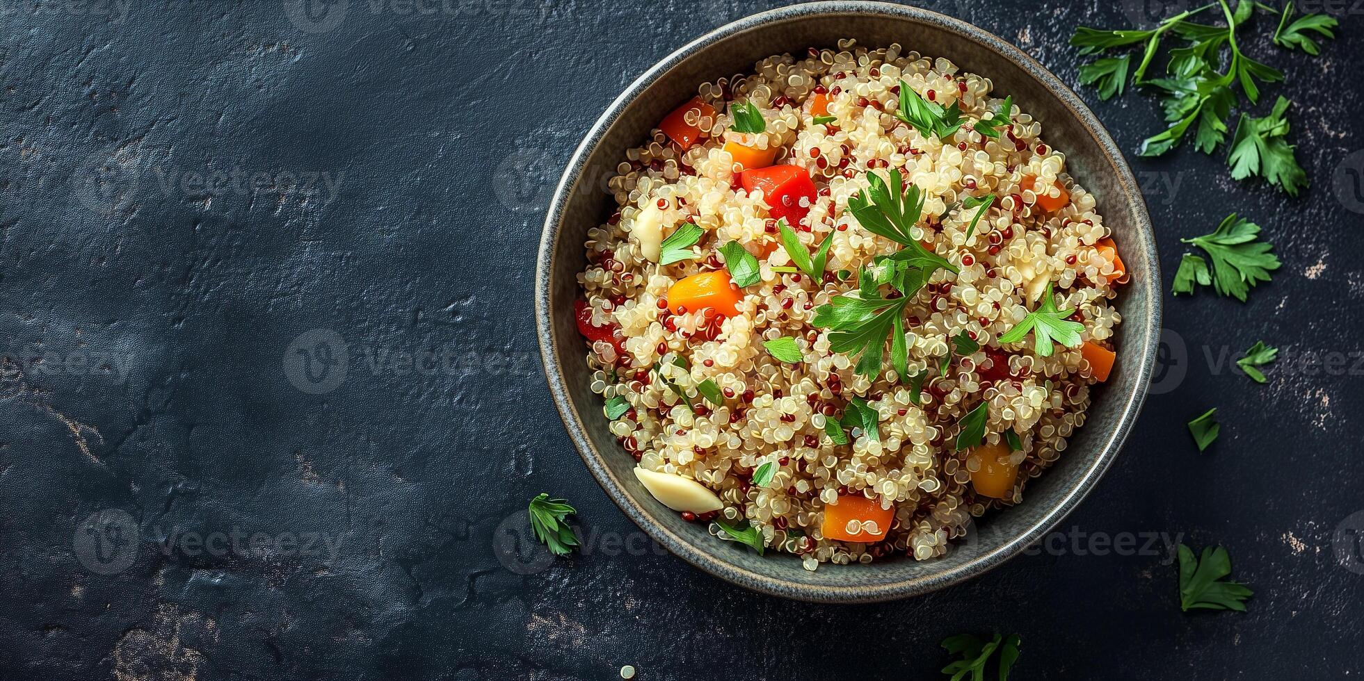 Quinoa portion served in a deep ceramic bowl with visible ingredients and simple garnish, food setting photo