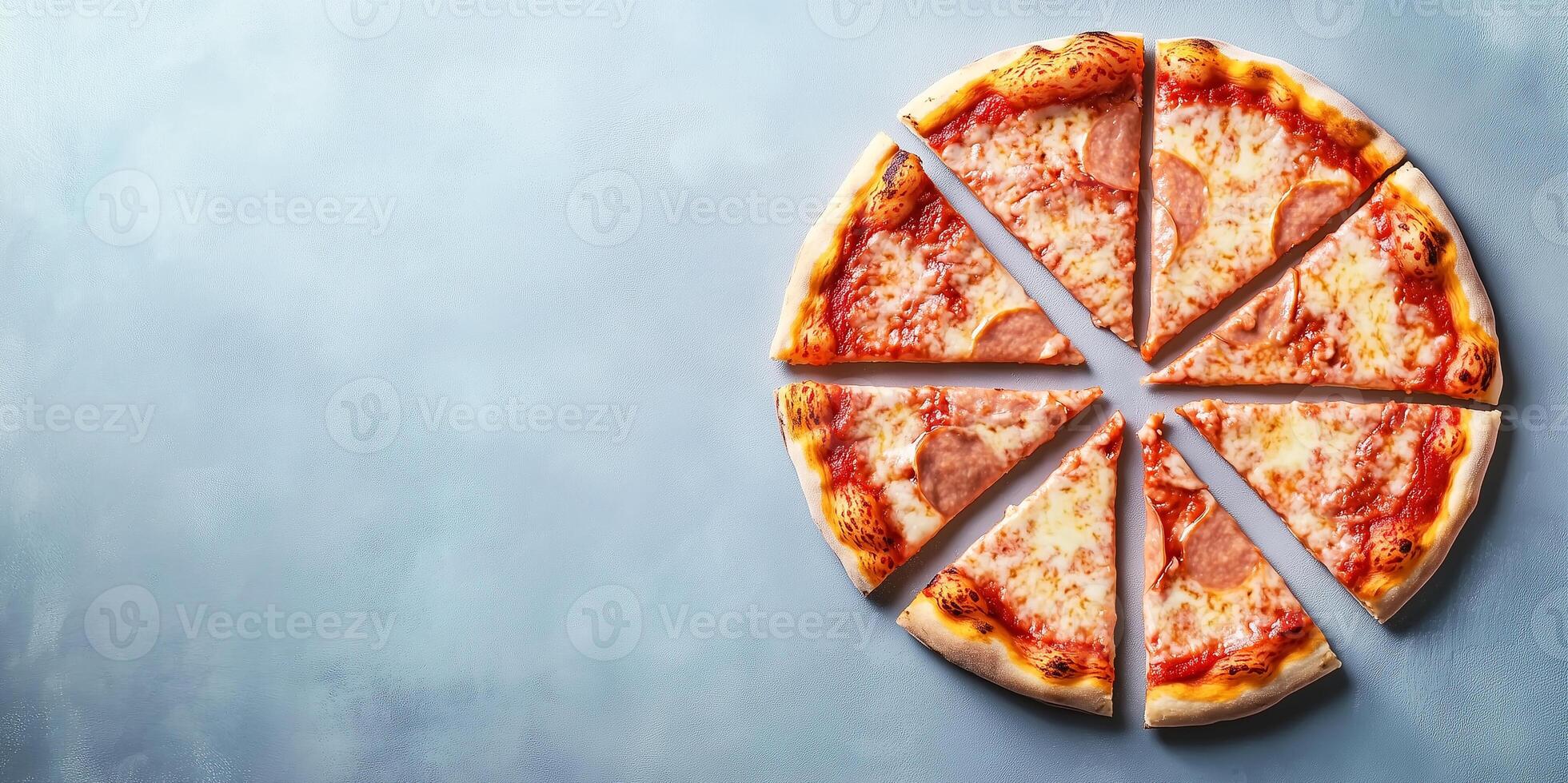 Top-down view of pastry assortment on a round wooden tray, food setting photo