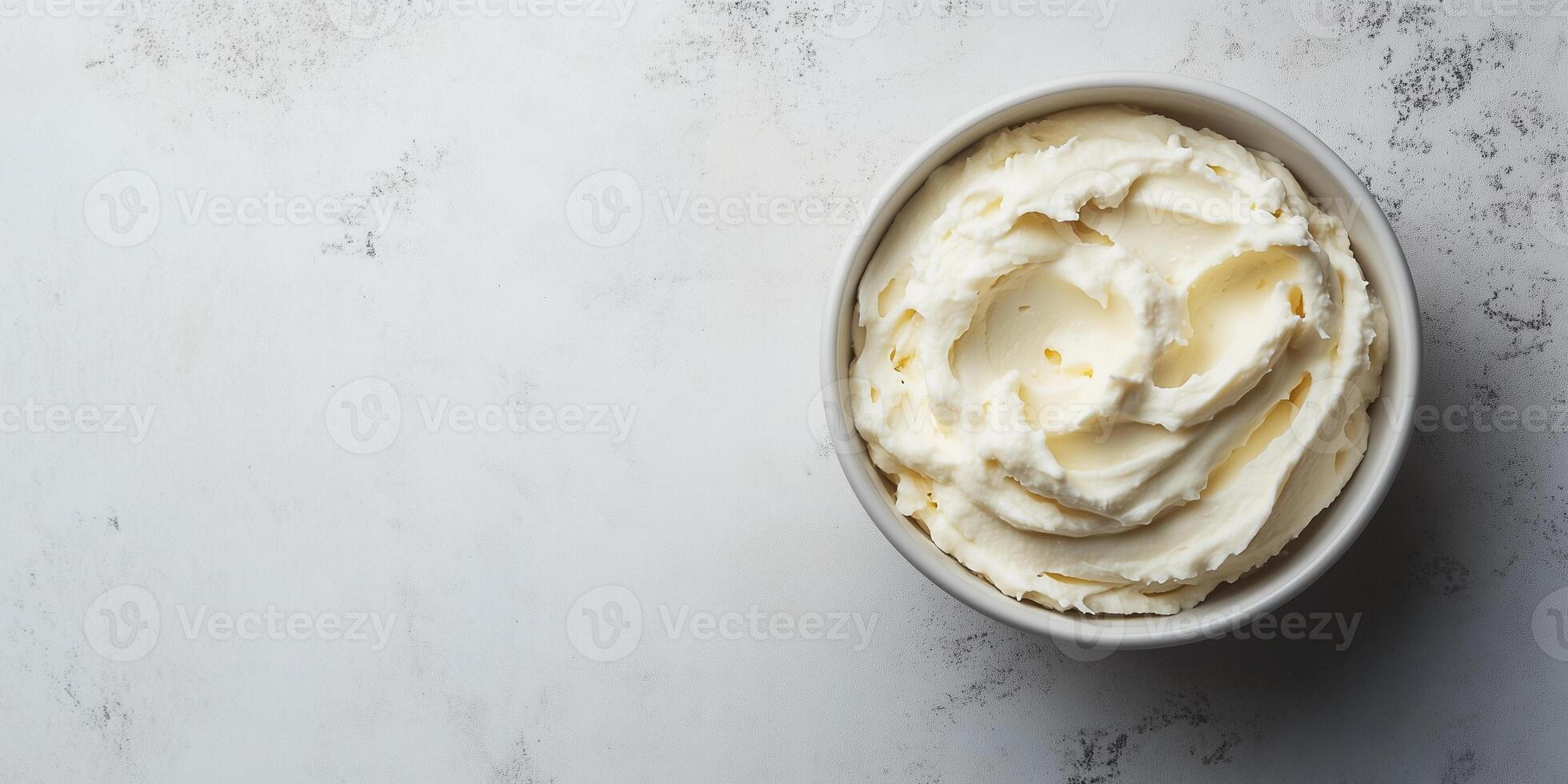 Spread in a small dish with an even surface and no visible toppings, photorealistic food photo