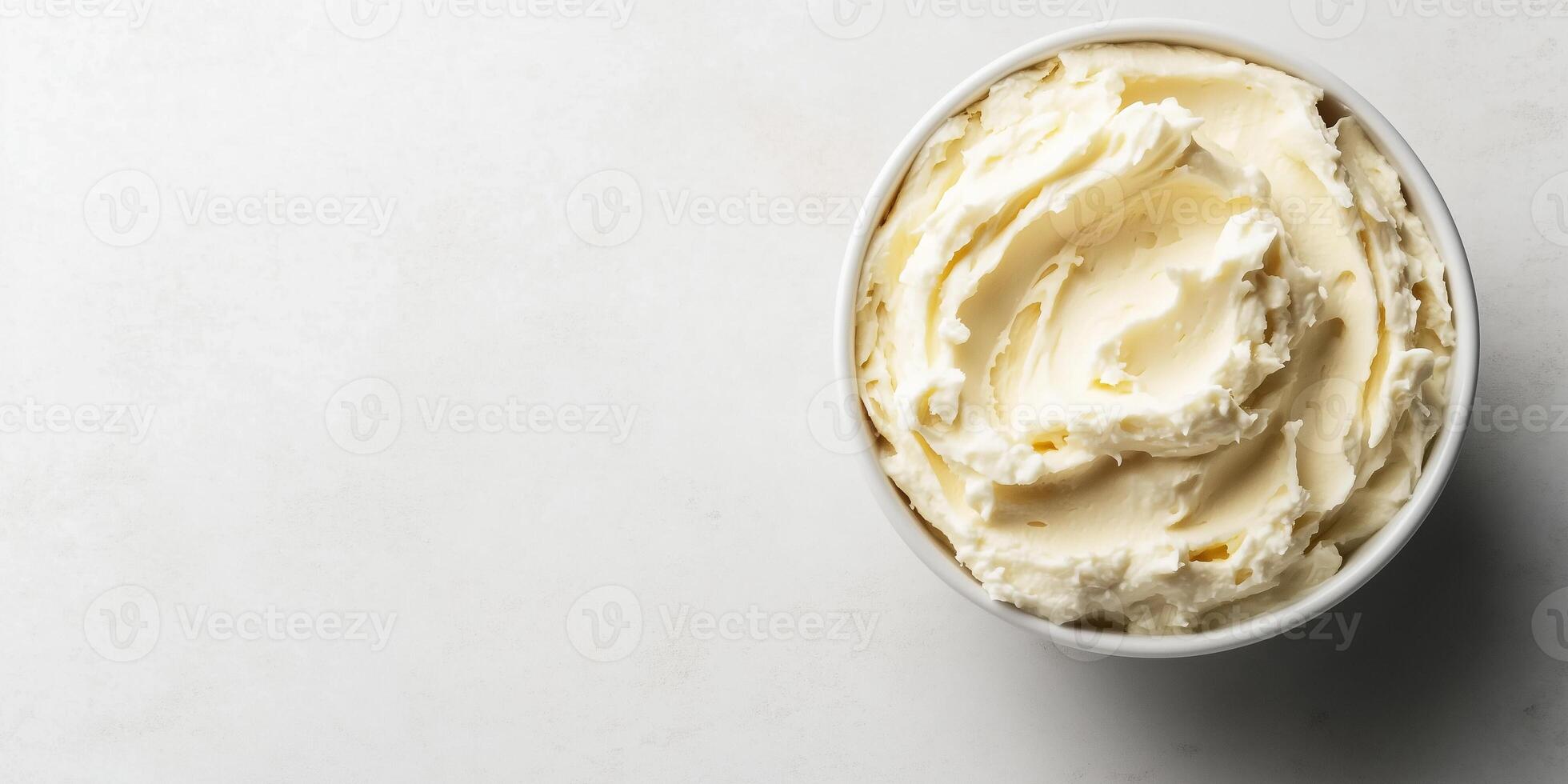 Close-up of spread in a round bowl with a smooth, uniform surface, food setting photo