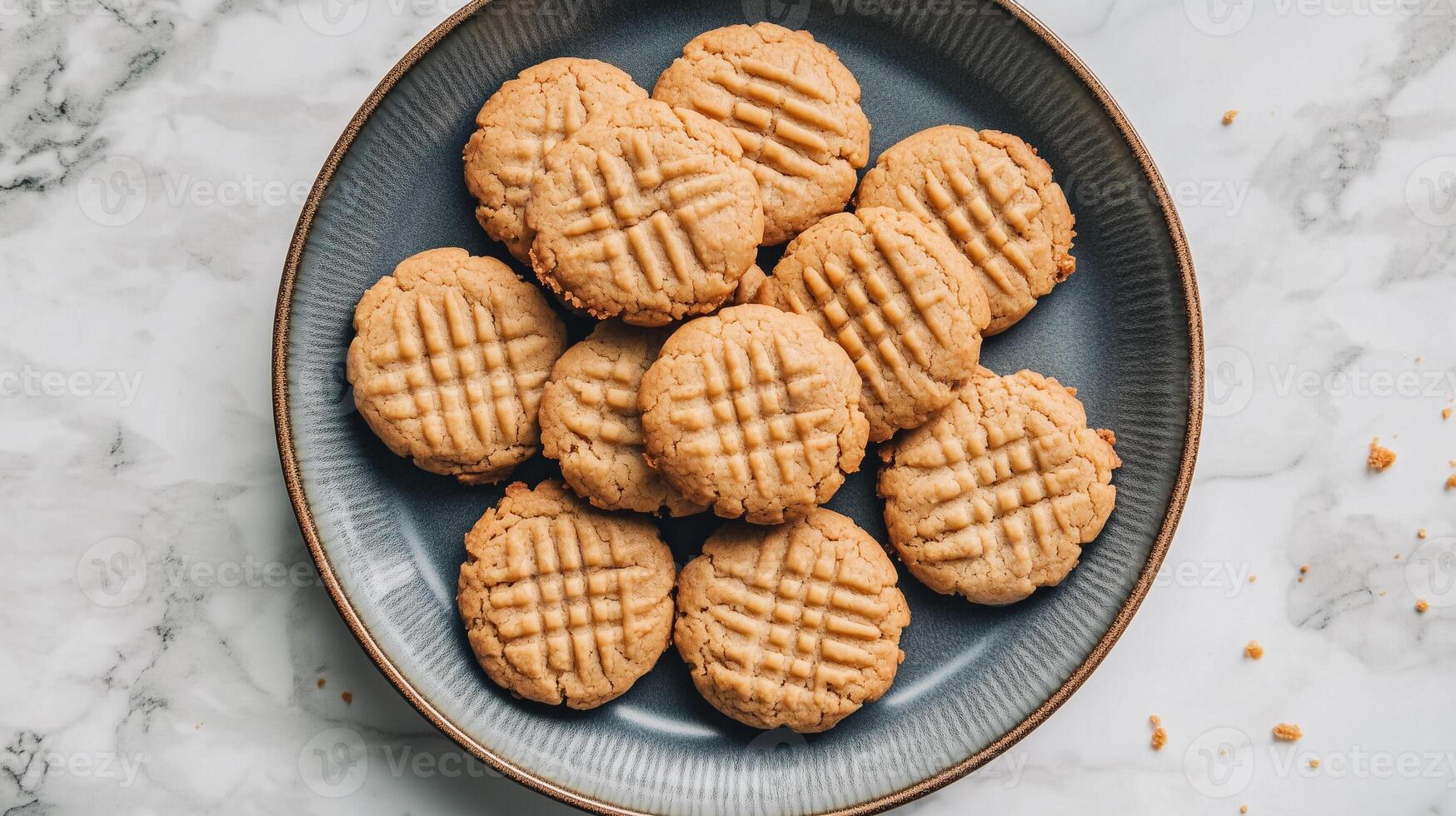 Collection of vegan peanut butter cookies laid out in a circular pattern on a plate, photorealistic food photo