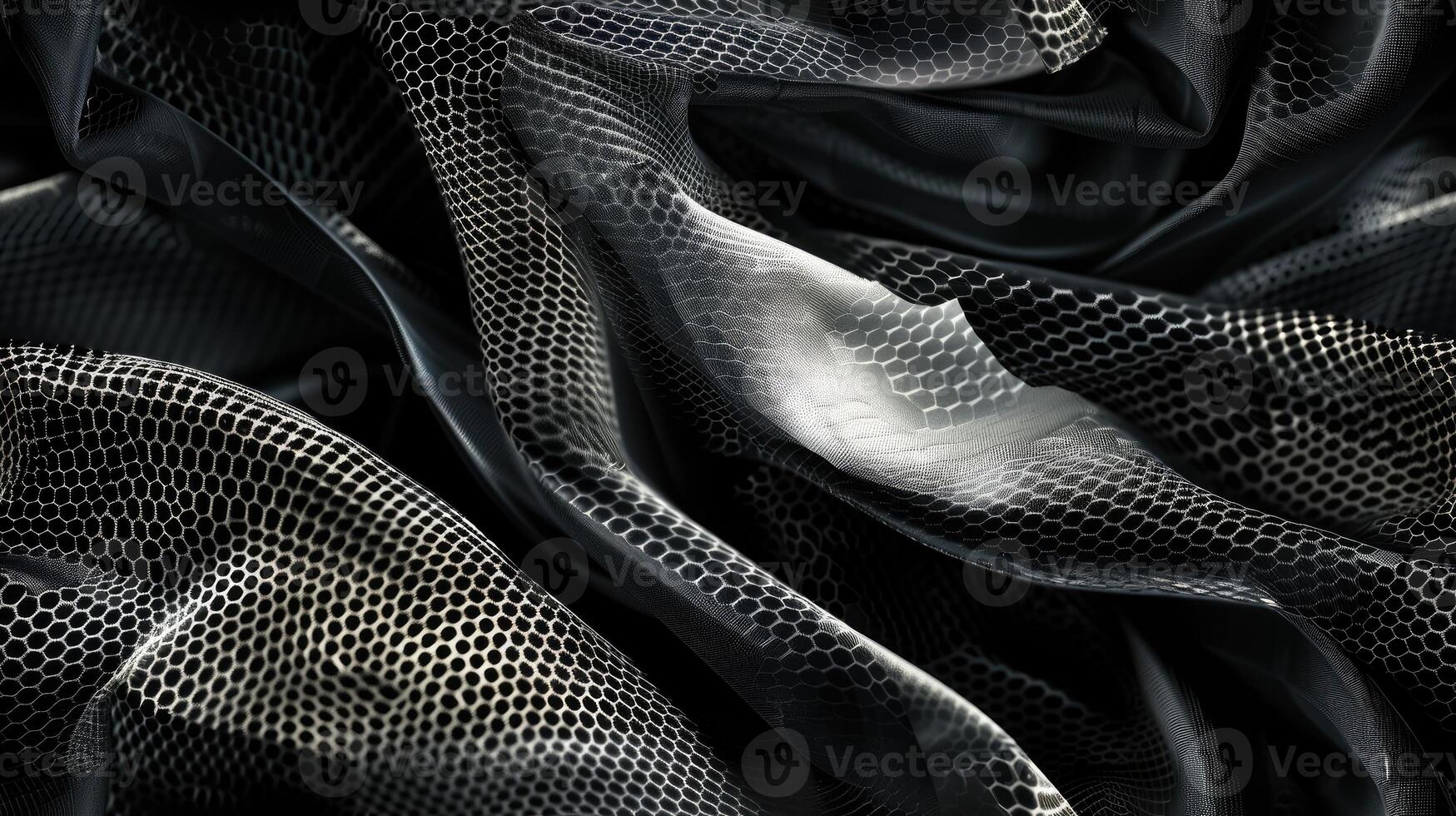 A black and white photo of a fabric with a pattern