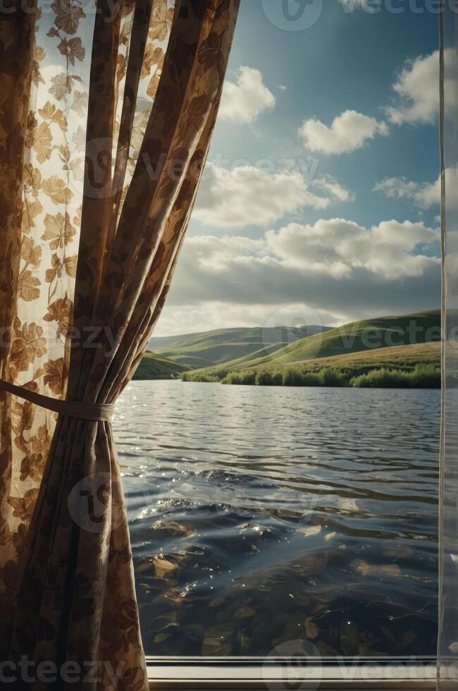 A serene view of hills and water through a patterned curtain. photo
