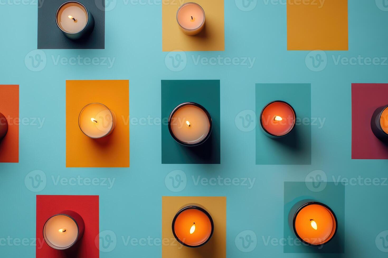 Burning Candles Arranged in a Colorful Grid Pattern photo