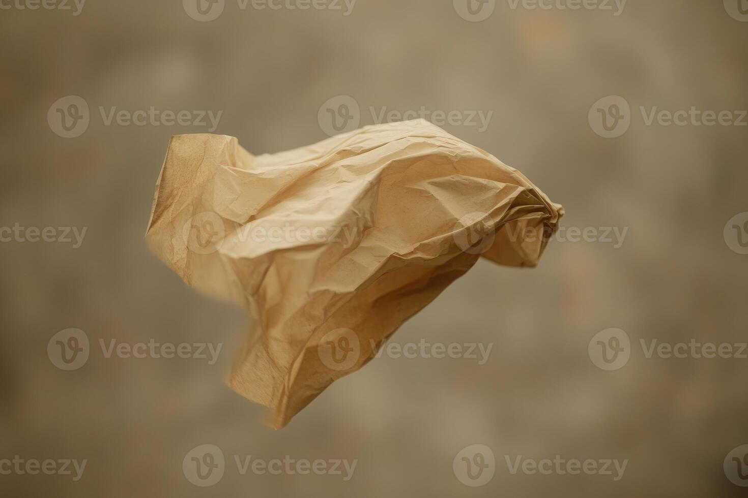 A Crumpled Brown Paper Bag Floating in Mid-Air photo