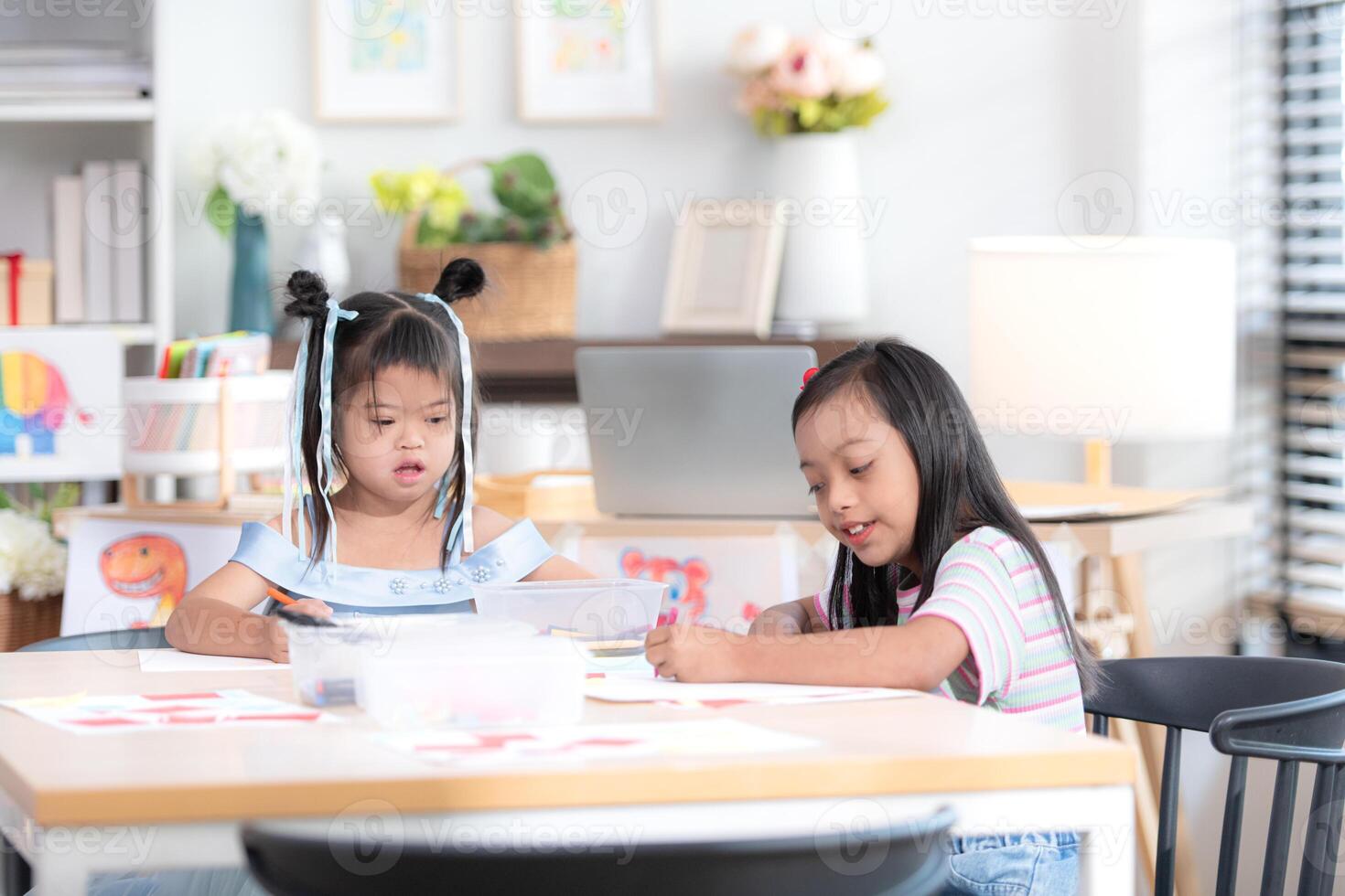 Portrait of special students doing learning activities in a special classroom photo