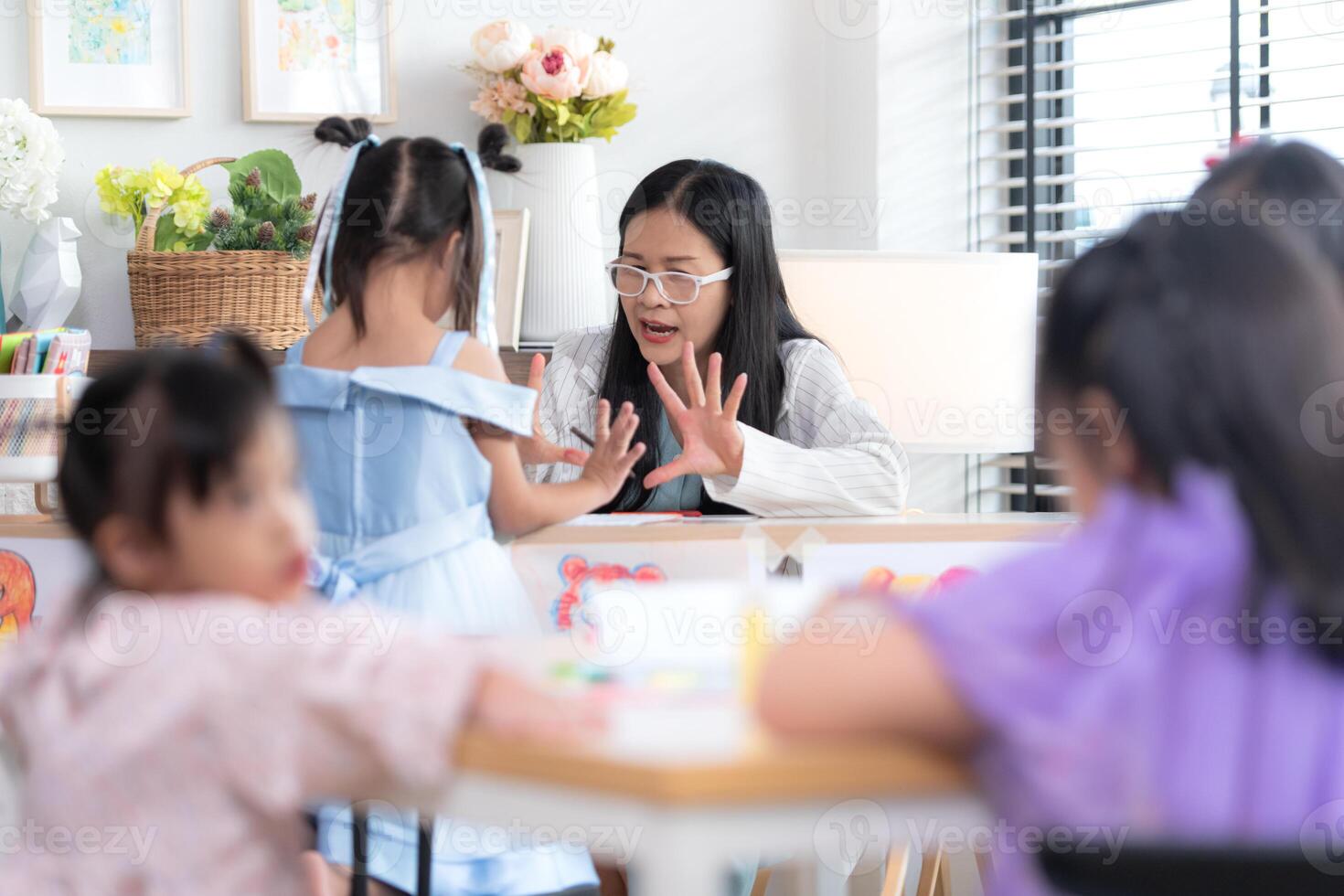Portrait of special students doing learning activities in a special classroom photo
