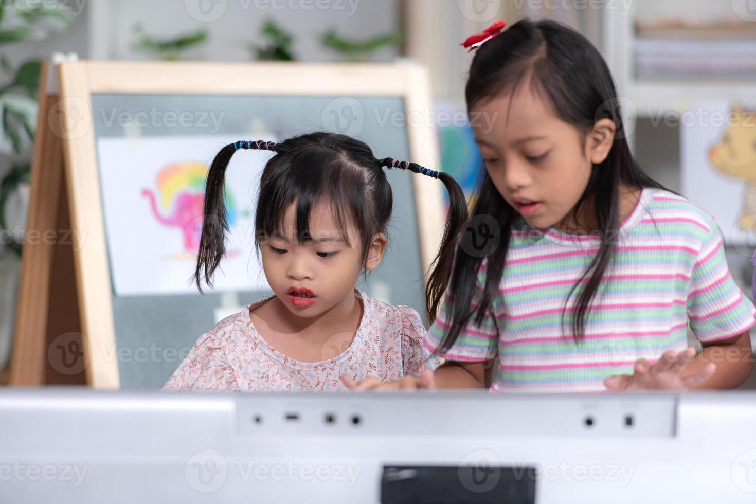 Portrait of special students doing learning activities in a special classroom photo
