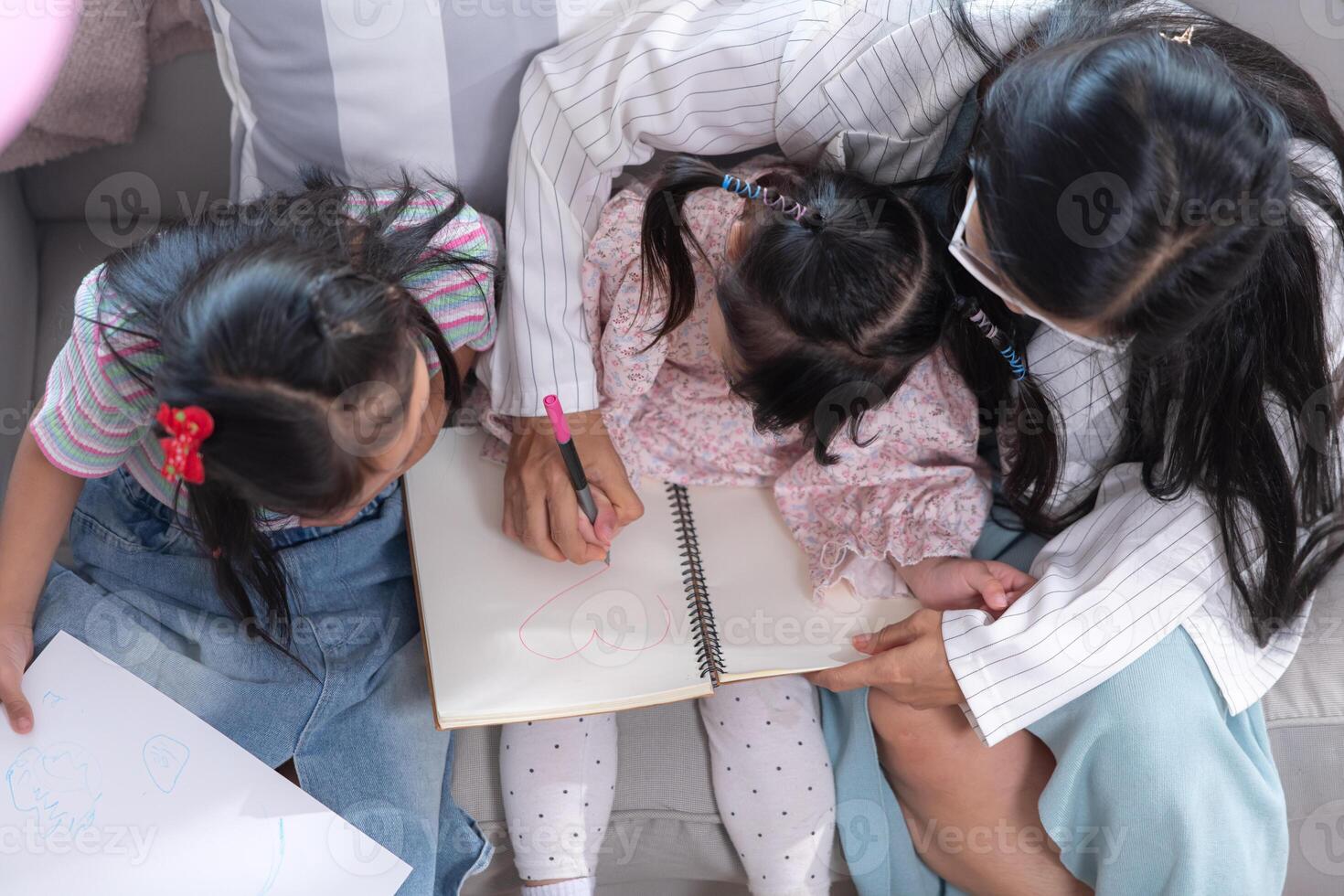 A group of special students doing learning activities in a special classroom photo