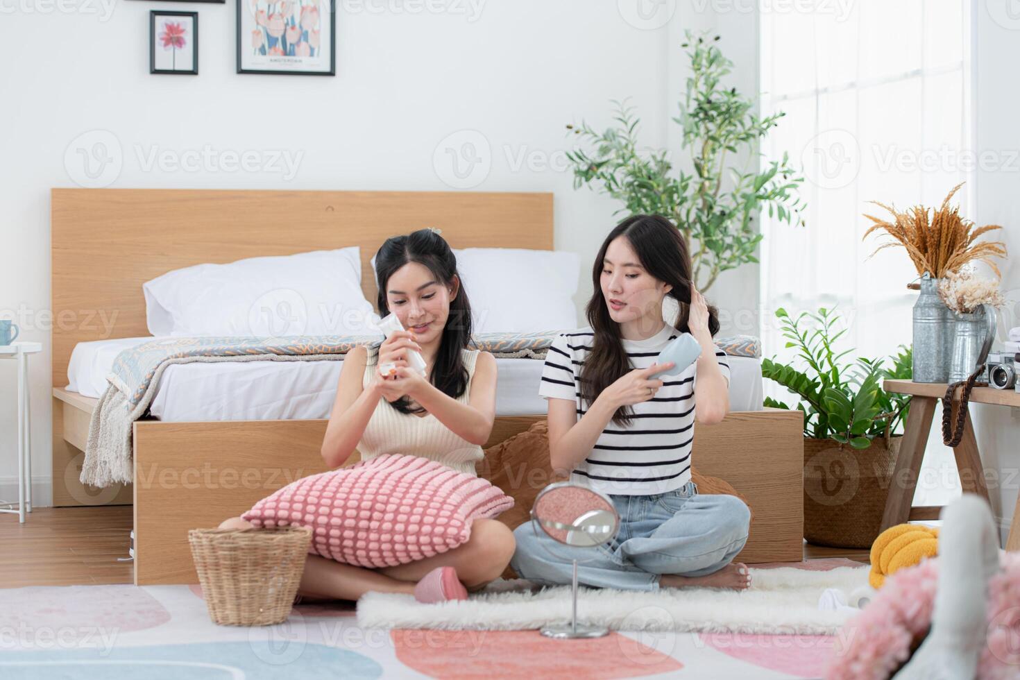 Asian young women conducting their weekly holiday routines from getting up, putting on cosmetics and relaxing photo