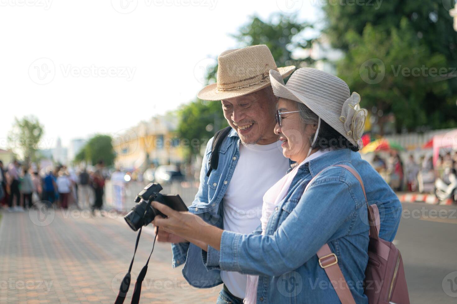Senior couples' tourist activities around the Grand Palace and Wat Phra Kaew, Thailand photo
