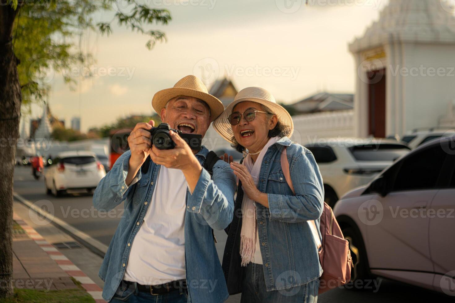 Senior couples' tourist activities around the Grand Palace, Thailand photo