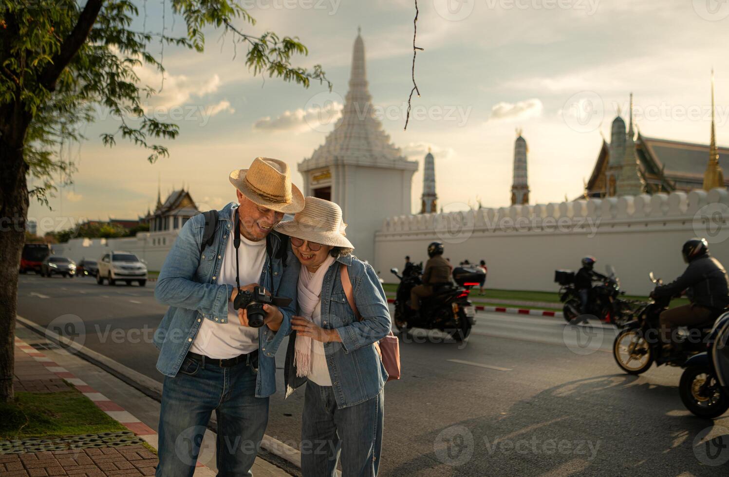 Senior couples' tourist activities around the Grand Palace, Thailand photo
