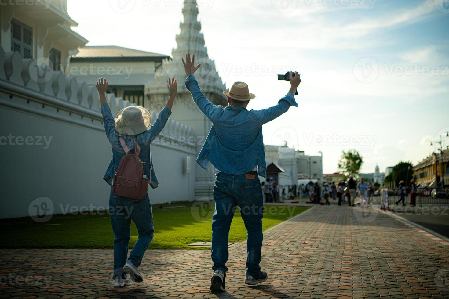 Senior couples' tourist activities around the Grand Palace and Wat Phra Kaew, Thailand photo