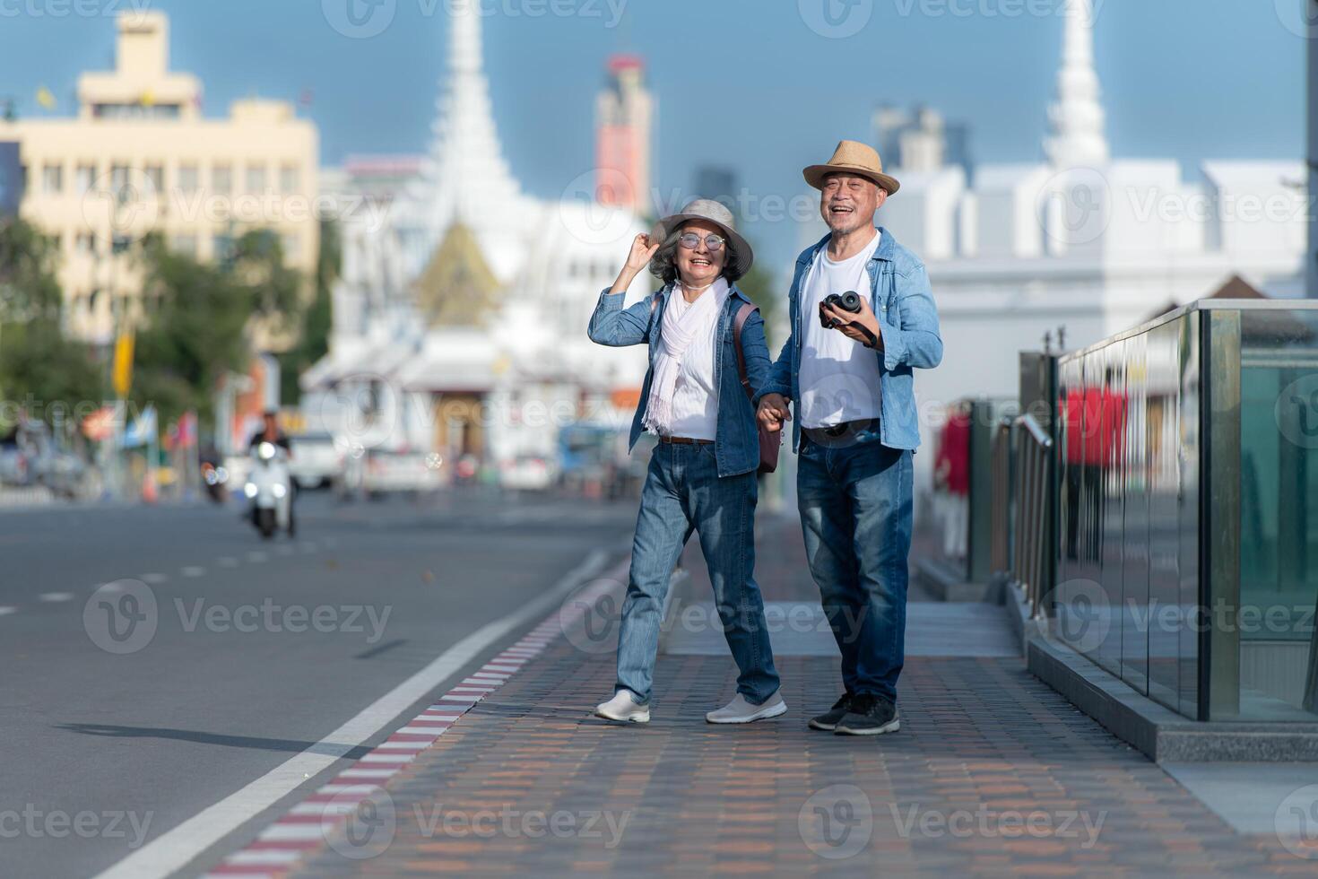 Senior couples' tourist activities around the Grand Palace and Wat Phra Kaew, Thailand photo