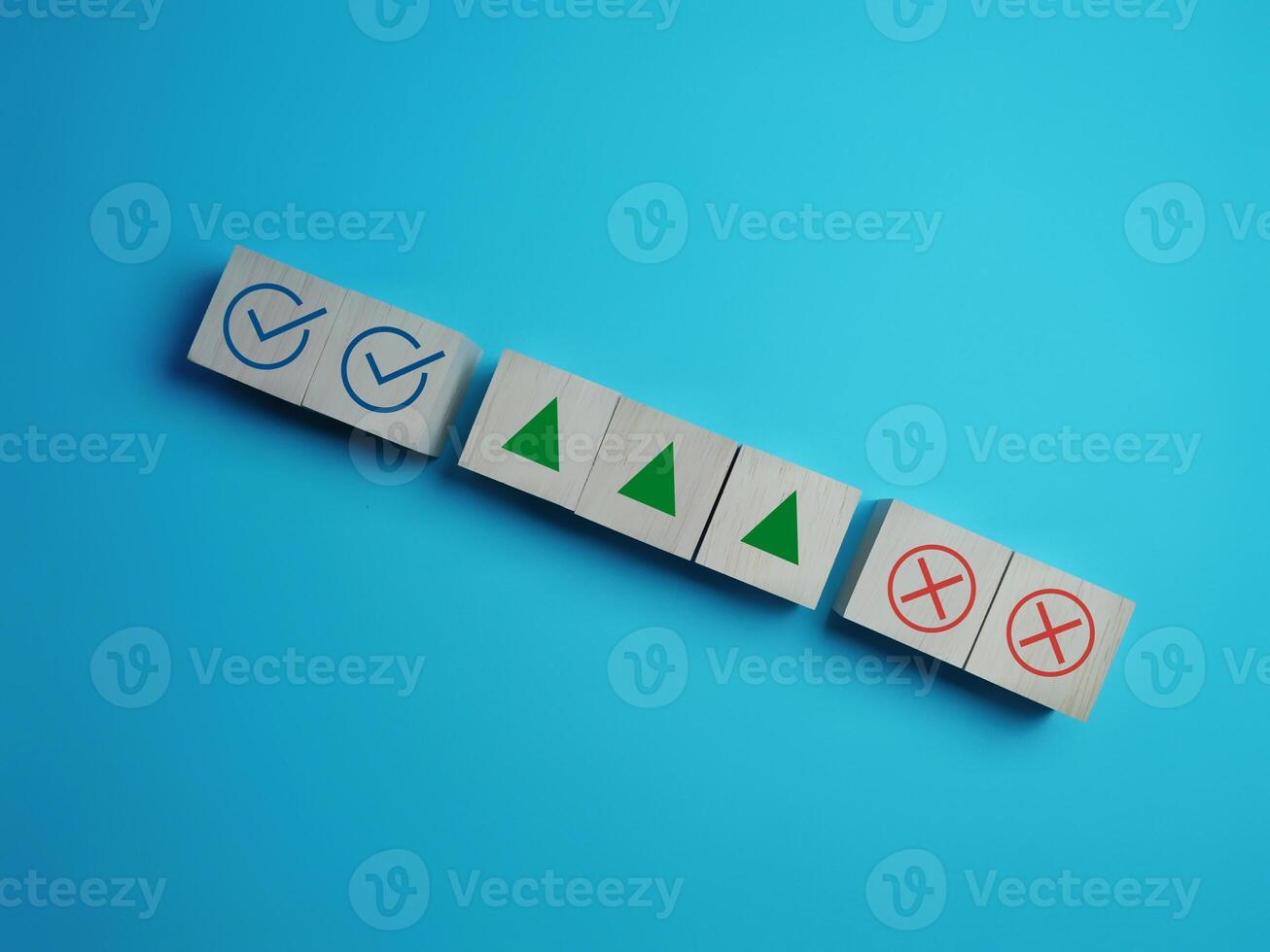 Decide on the uptrend, true and false with the up arrow on the block, wood photo