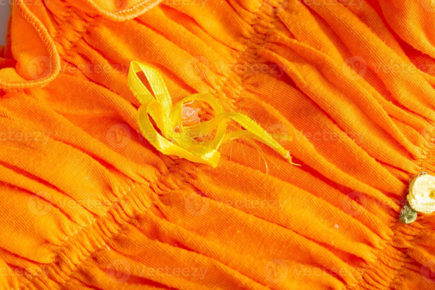 Children's bright colorful dress, background, close-up. Summer photo