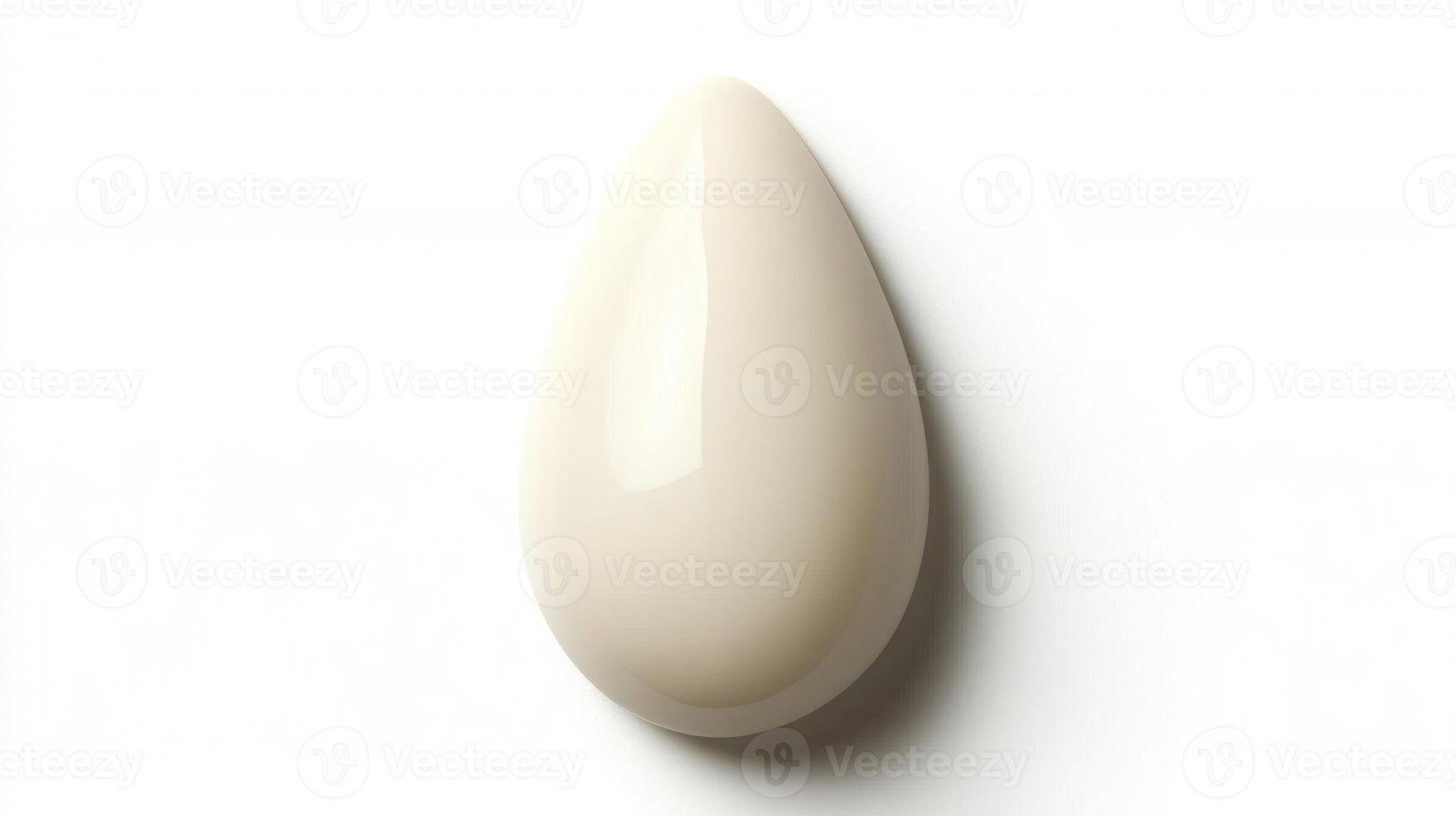 Beauty blender resting elegantly on a white surface showcasing its smooth curves and design photo