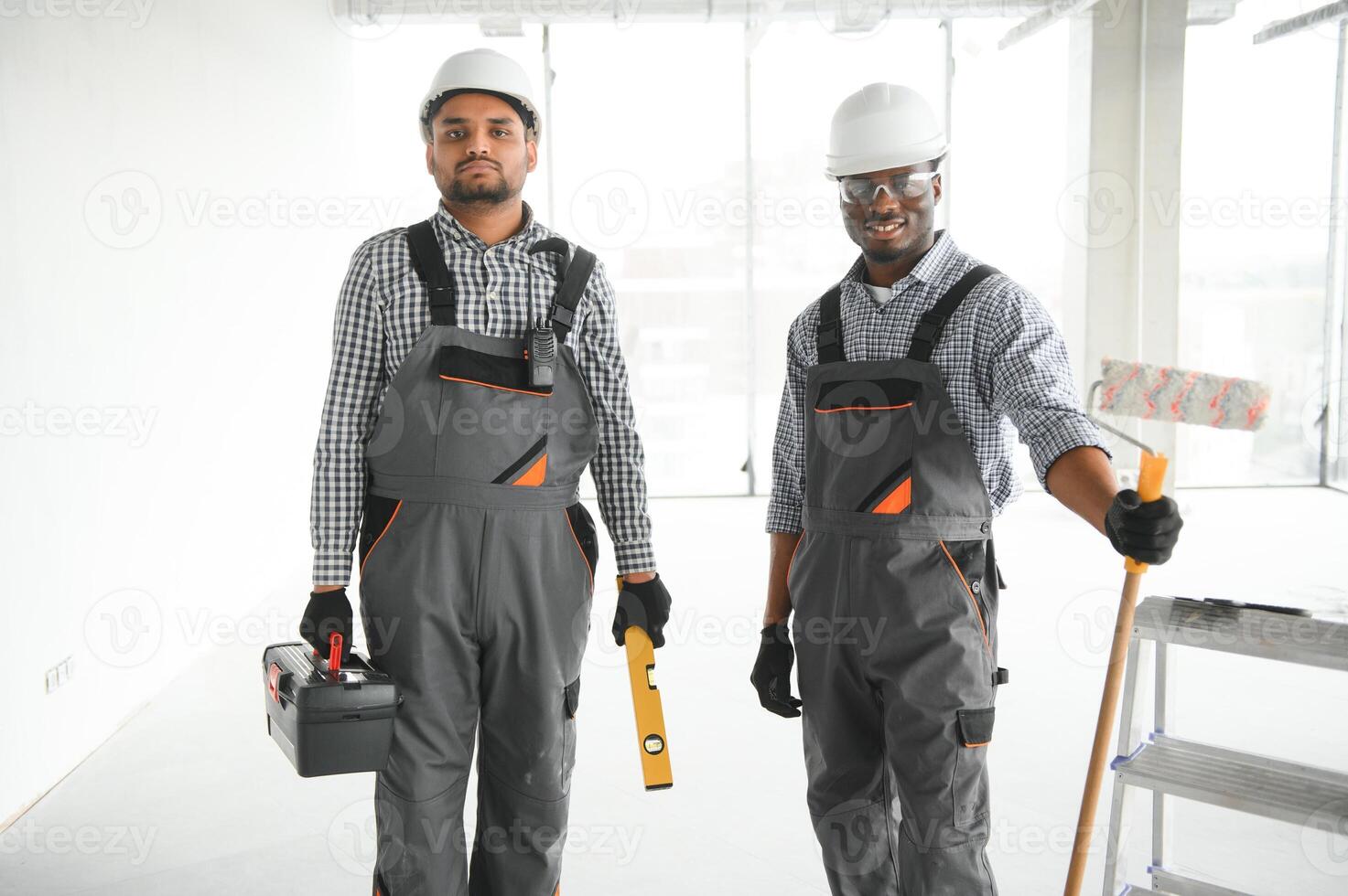 Group of multi ethnic engineer construction site worker meeting at workplace photo