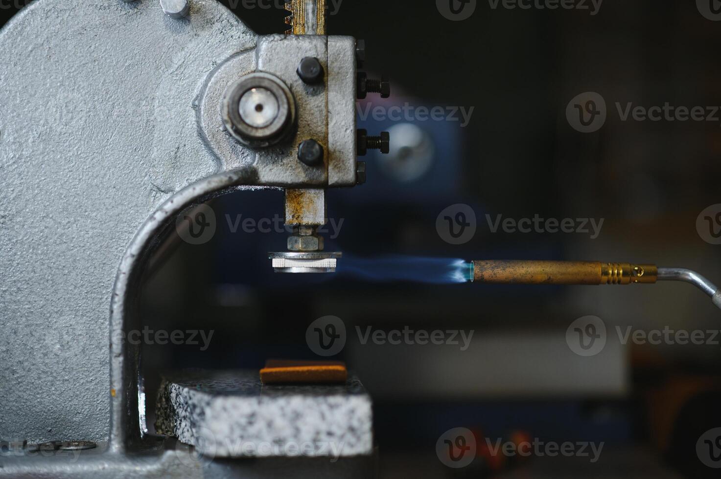 leather craftsman is carefully to make a leather product for a customer. Leather craftsman concept photo