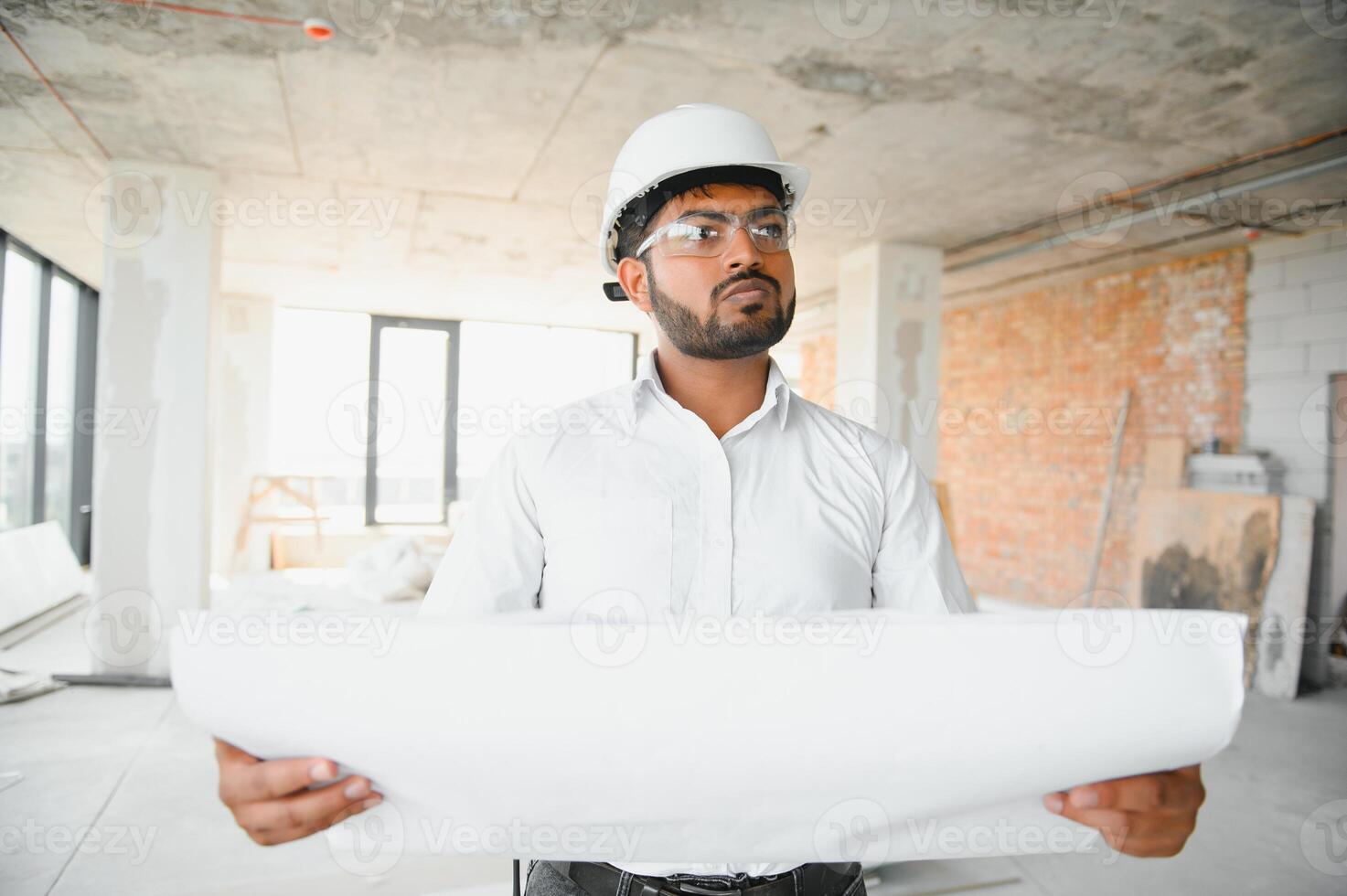 Asian Engineer standing on site construction posting confident , Engineer construction happy job success photo