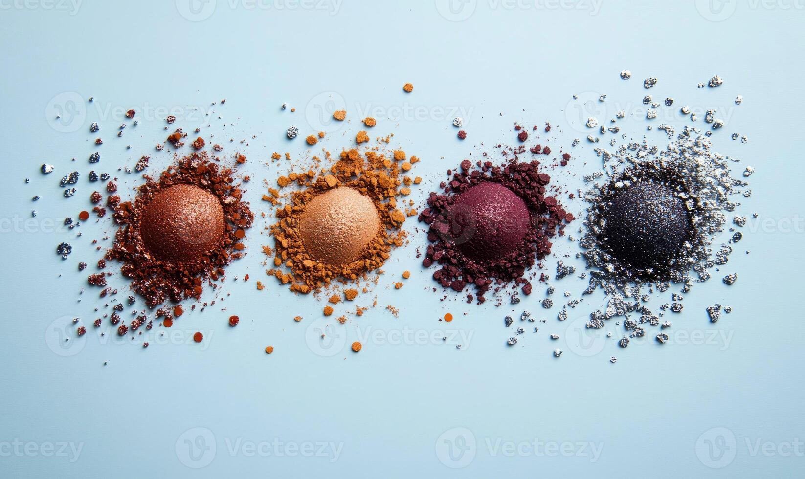 A palette of eyeshadow shades warm amber, soft terracotta, rich copper, and deep burgundy, accented with silver confetti photo