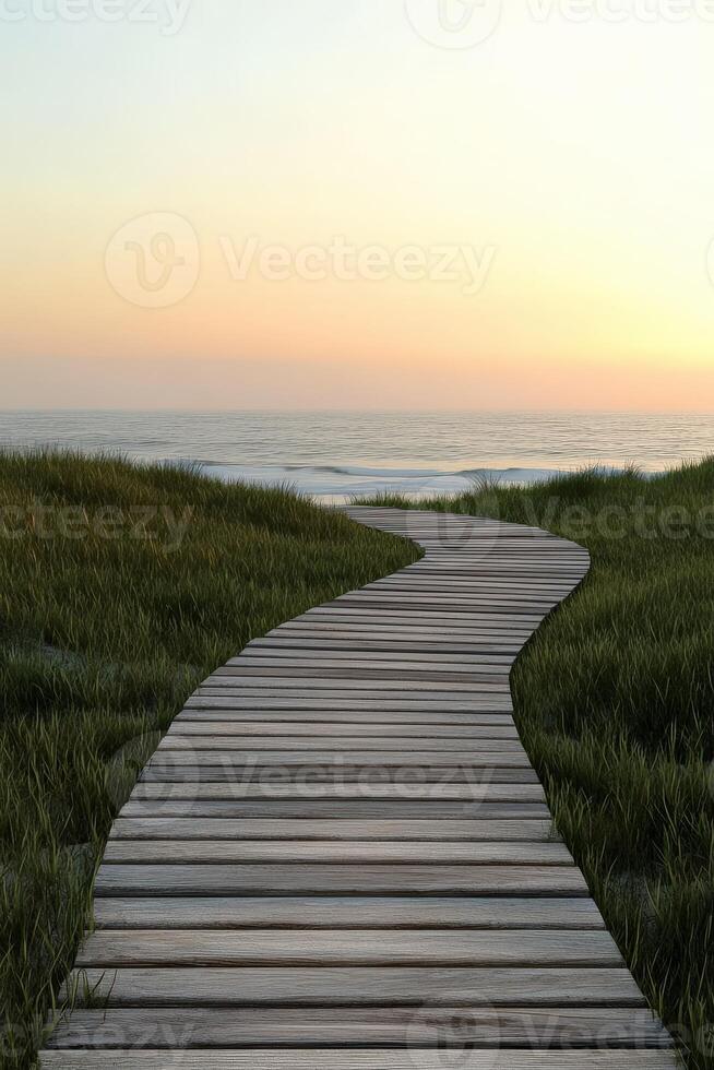 Serene wooden pathway leading to the ocean at sunset photo