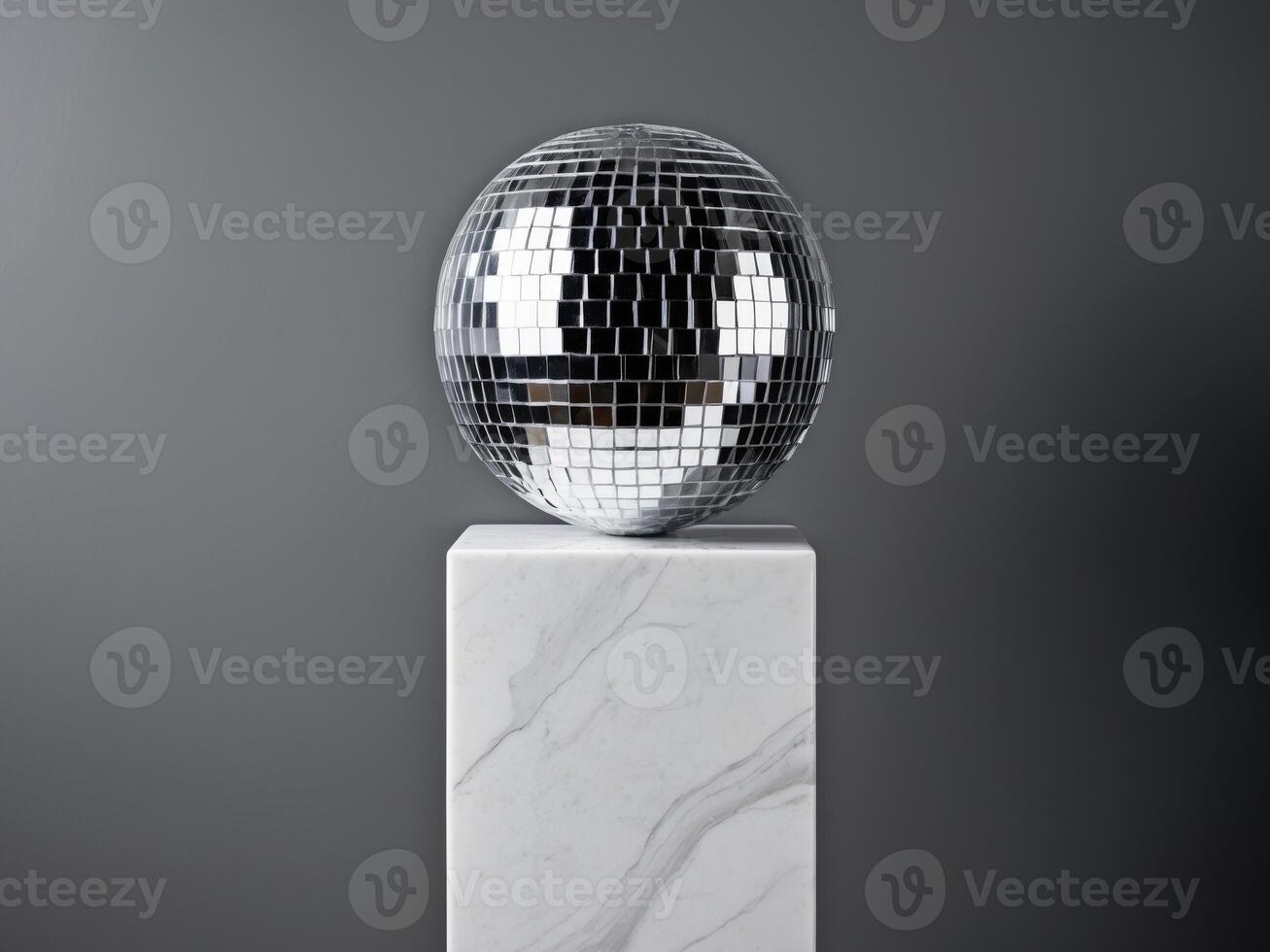 Disco Ball on Marble Pedestal - Modern Party Decor. photo